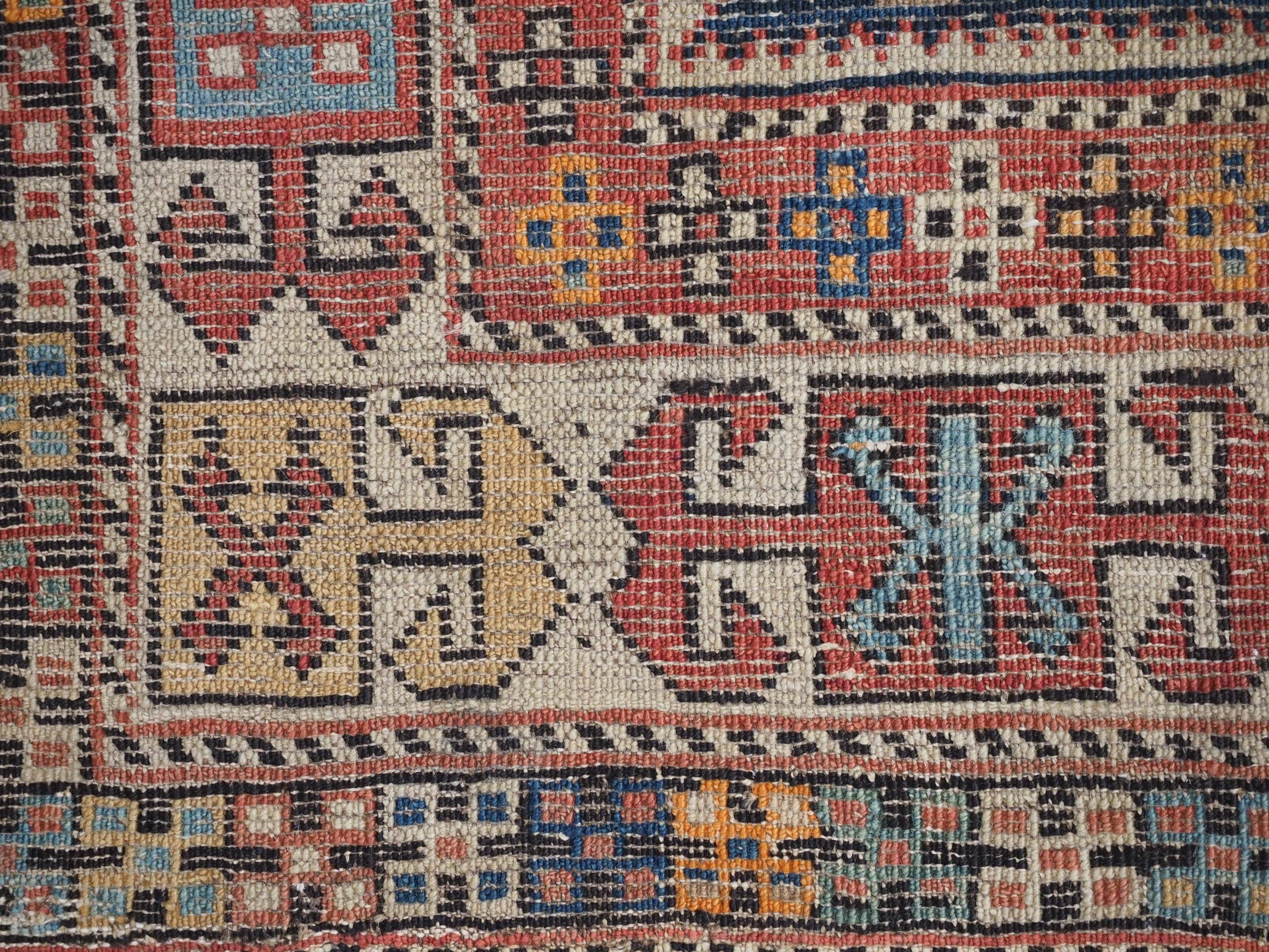 Antique East Caucasian Akstafa rug with twin medallions.  Circa 1890. For Sale 9