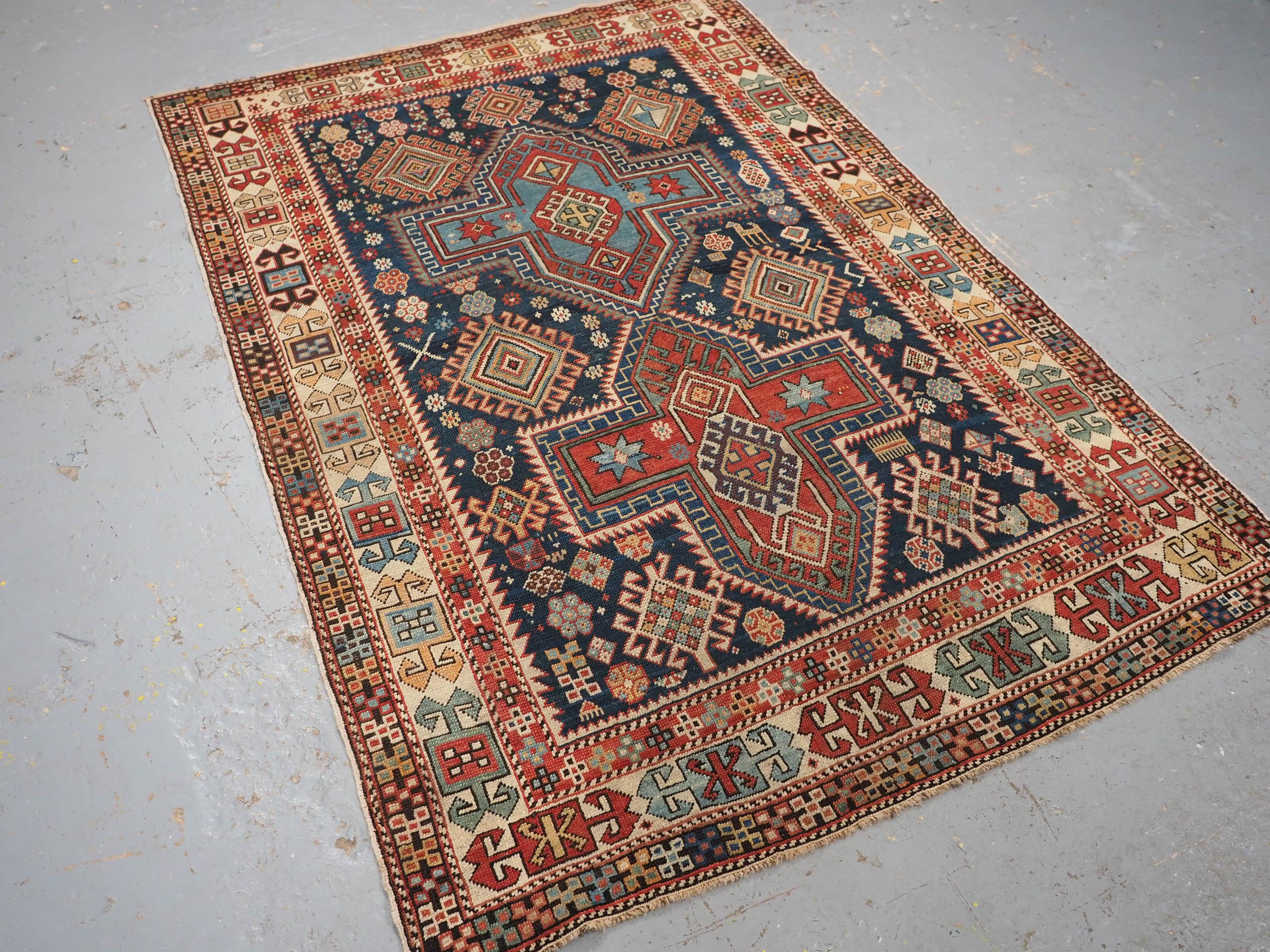 Antique East Caucasian Akstafa rug with twin medallions.  Circa 1890. In Good Condition For Sale In Moreton-In-Marsh, GB