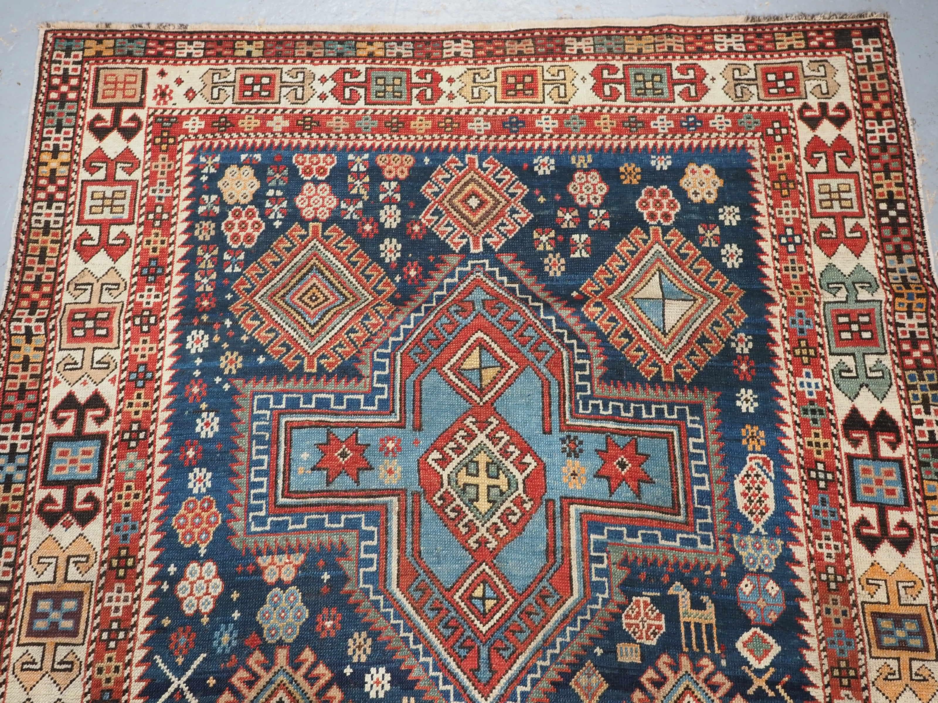 Late 20th Century Antique East Caucasian Akstafa rug with twin medallions.  Circa 1890. For Sale