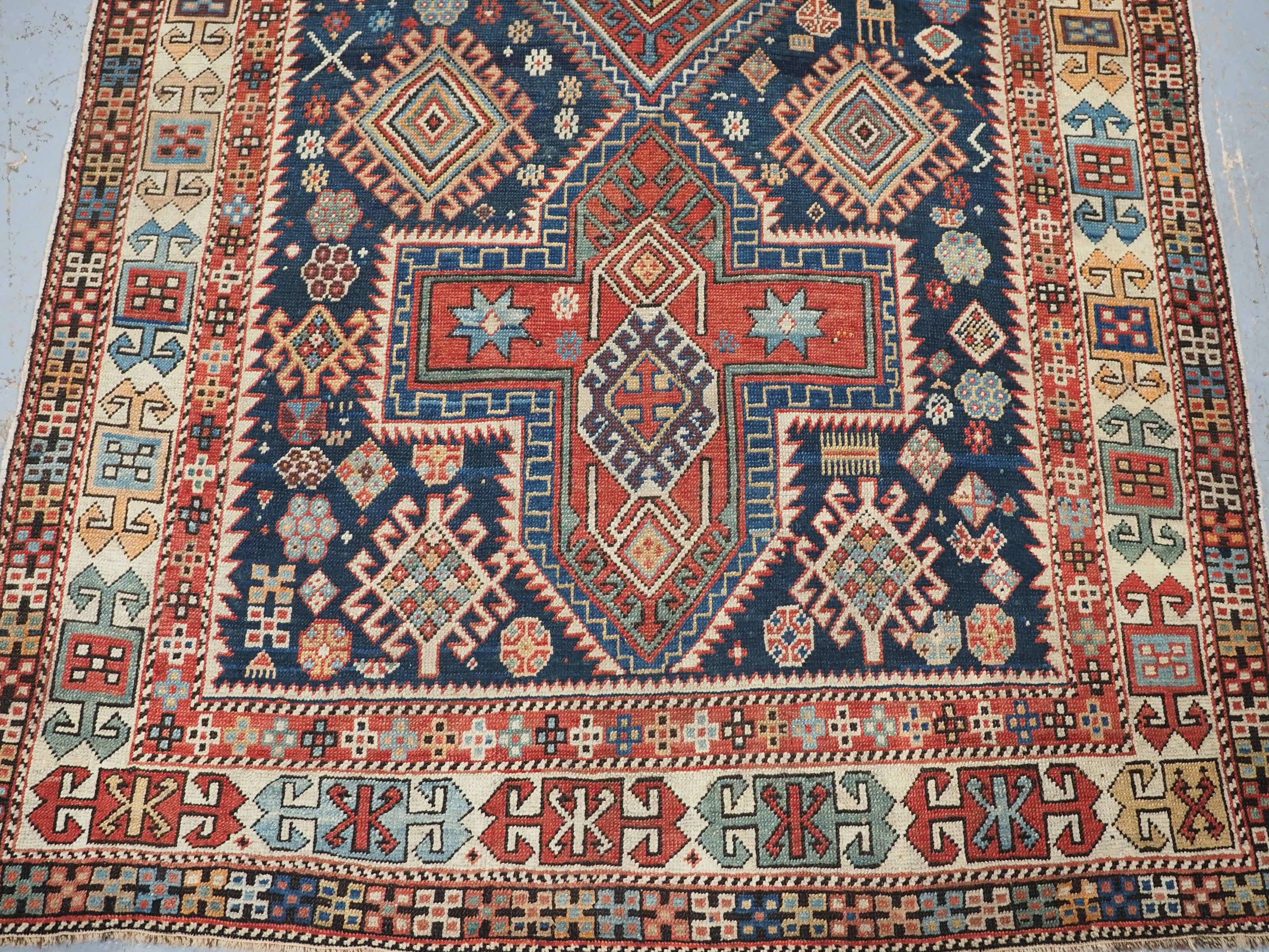Antique East Caucasian Akstafa rug with twin medallions.  Circa 1890. For Sale 1