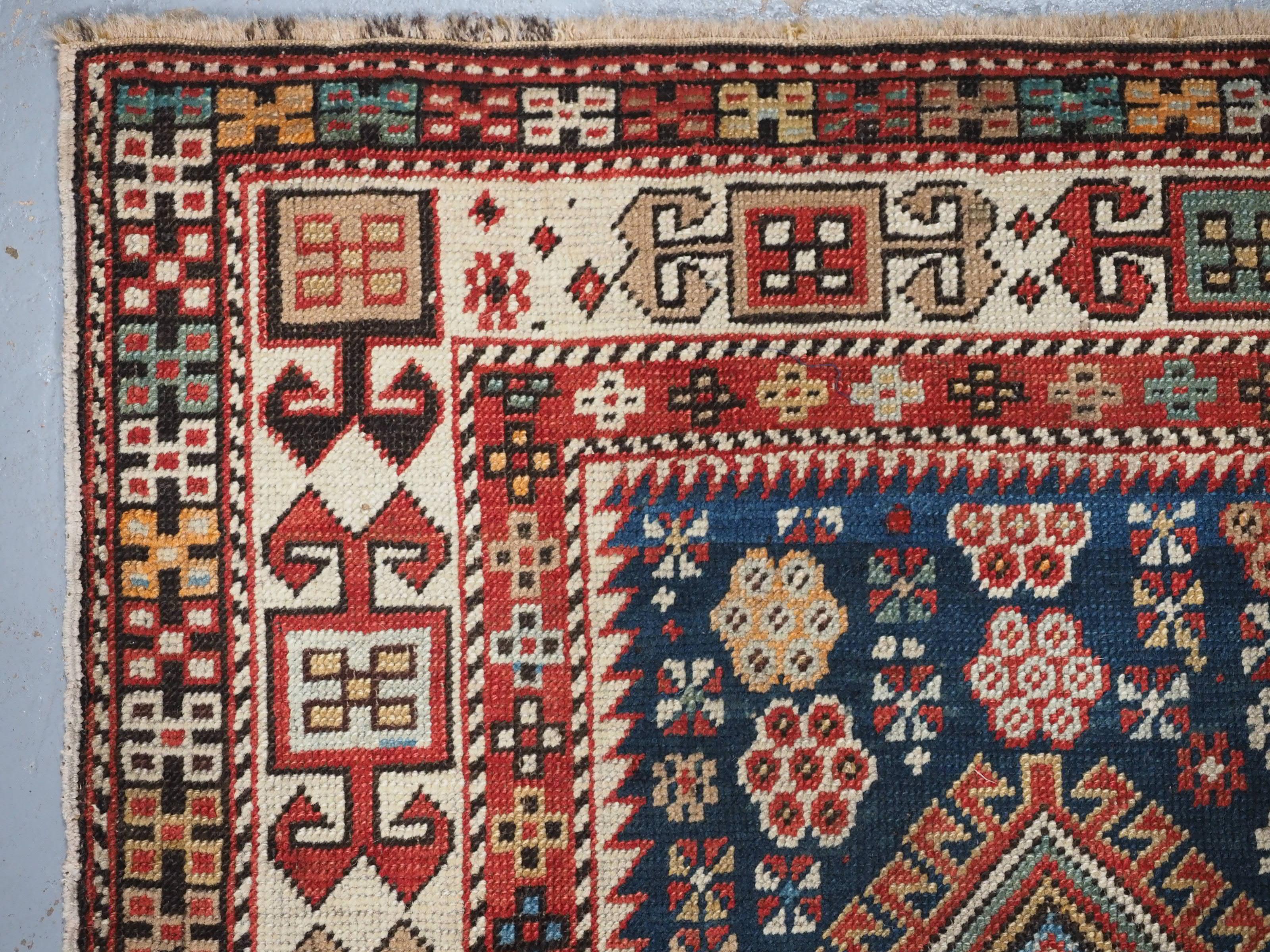 Antique East Caucasian Akstafa rug with twin medallions.  Circa 1890. For Sale 2