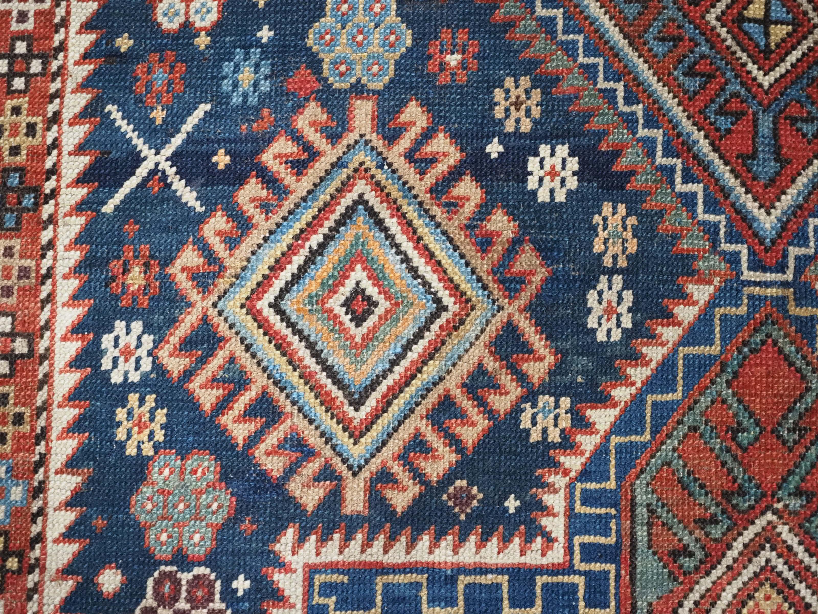 Antique East Caucasian Akstafa rug with twin medallions.  Circa 1890. For Sale 4