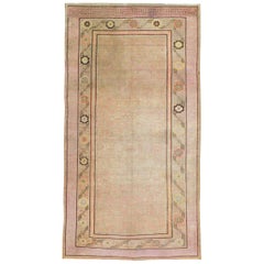 Ancien tapis de galerie Khotan du Turkestan oriental