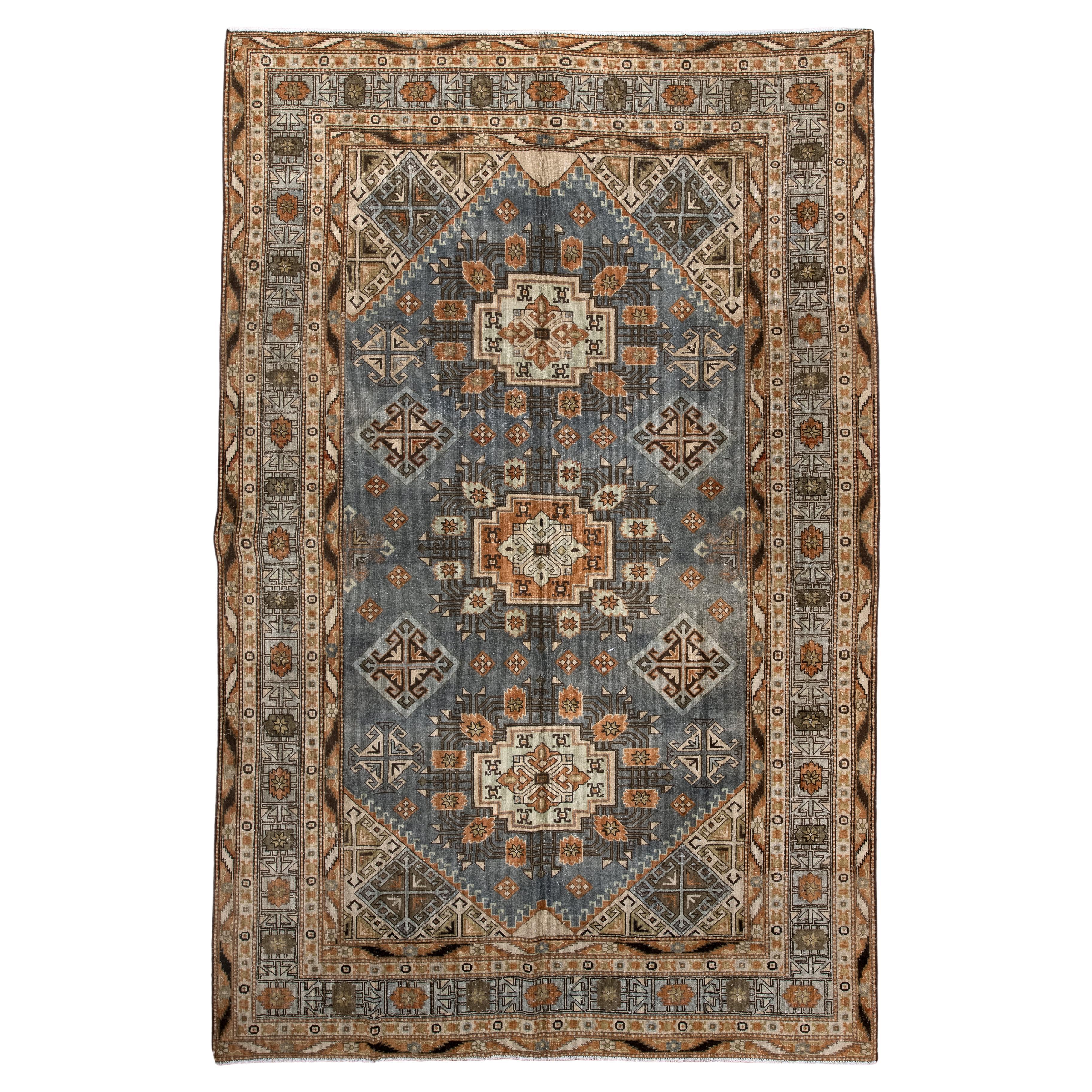 Tapis ancien du Turkestan oriental Khotan avec médaillons géométriques en vente