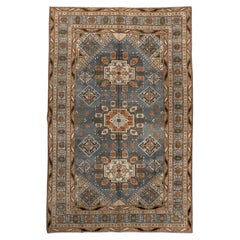 Tapis ancien du Turkestan oriental Khotan avec médaillons géométriques