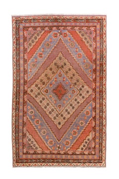 Antique East Turkestan Khotan Rug with Soft Lavender and Terracotta Medallions