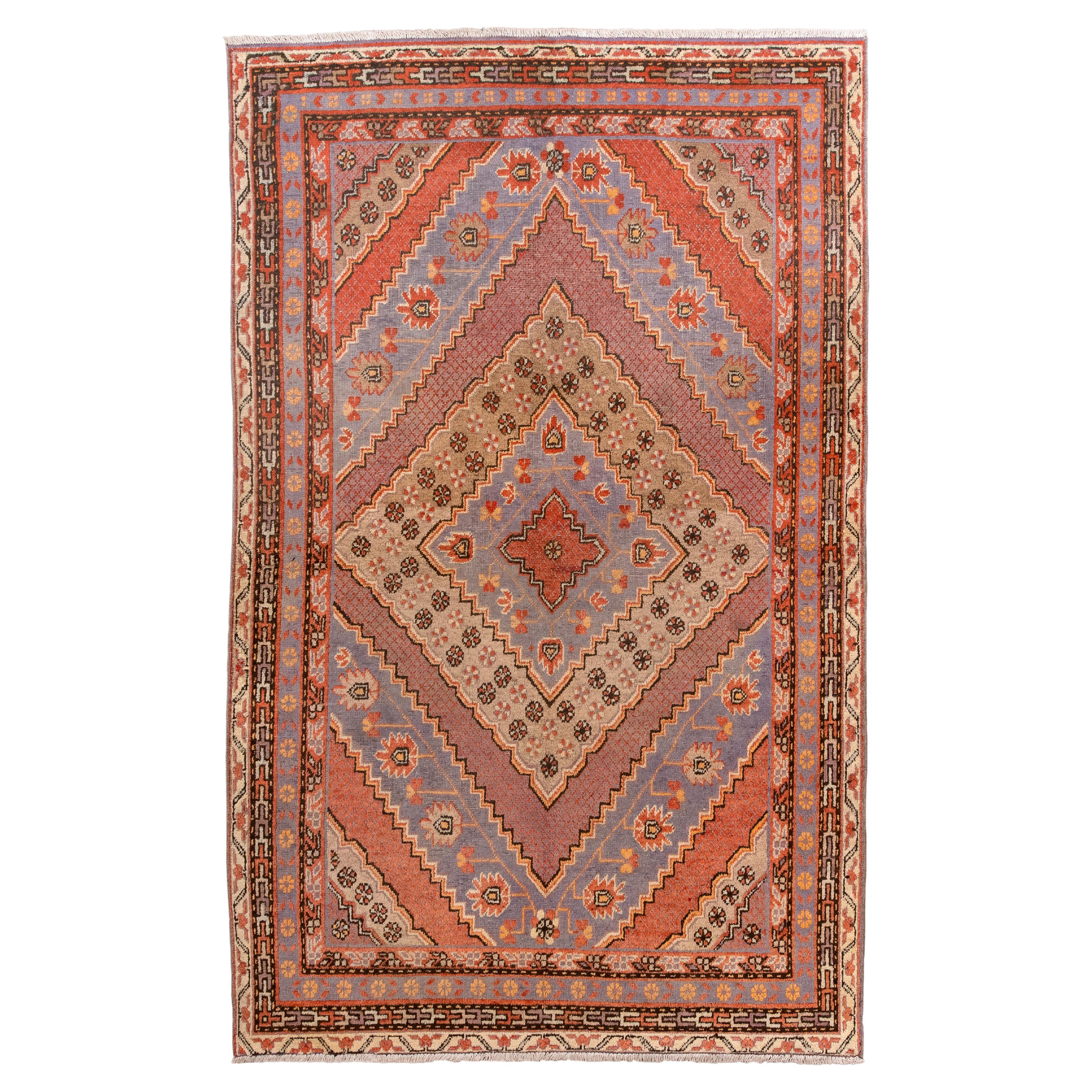 Antico tappeto Khotan del Turkestan orientale con morbidi medaglioni in lavanda e terracotta in vendita