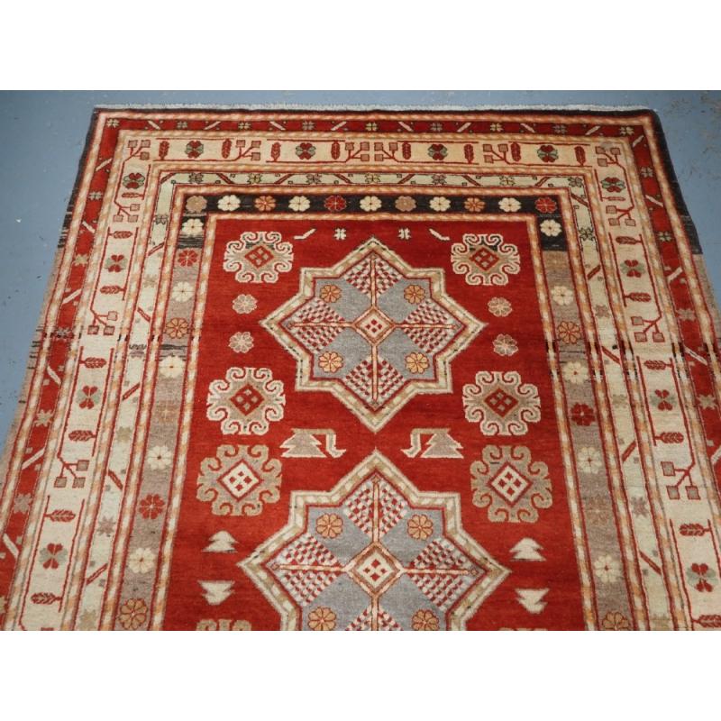 Unknown Antique East Turkestan Khotan Rug With Three Star Medallions, Circa 1920 For Sale