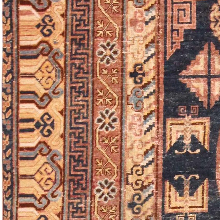 20th Century Antique East Turkestan Khotan Rug. 7 ft 4 in x 14 ft 4 in For Sale