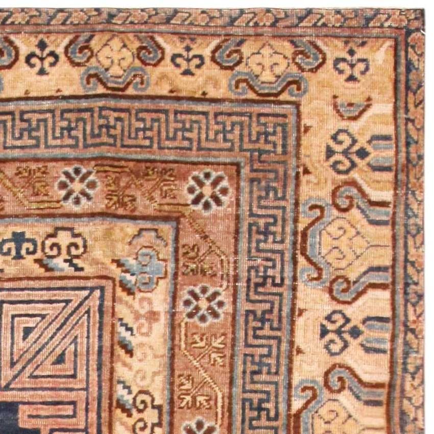 Wool Antique East Turkestan Khotan Rug. 7 ft 4 in x 14 ft 4 in For Sale