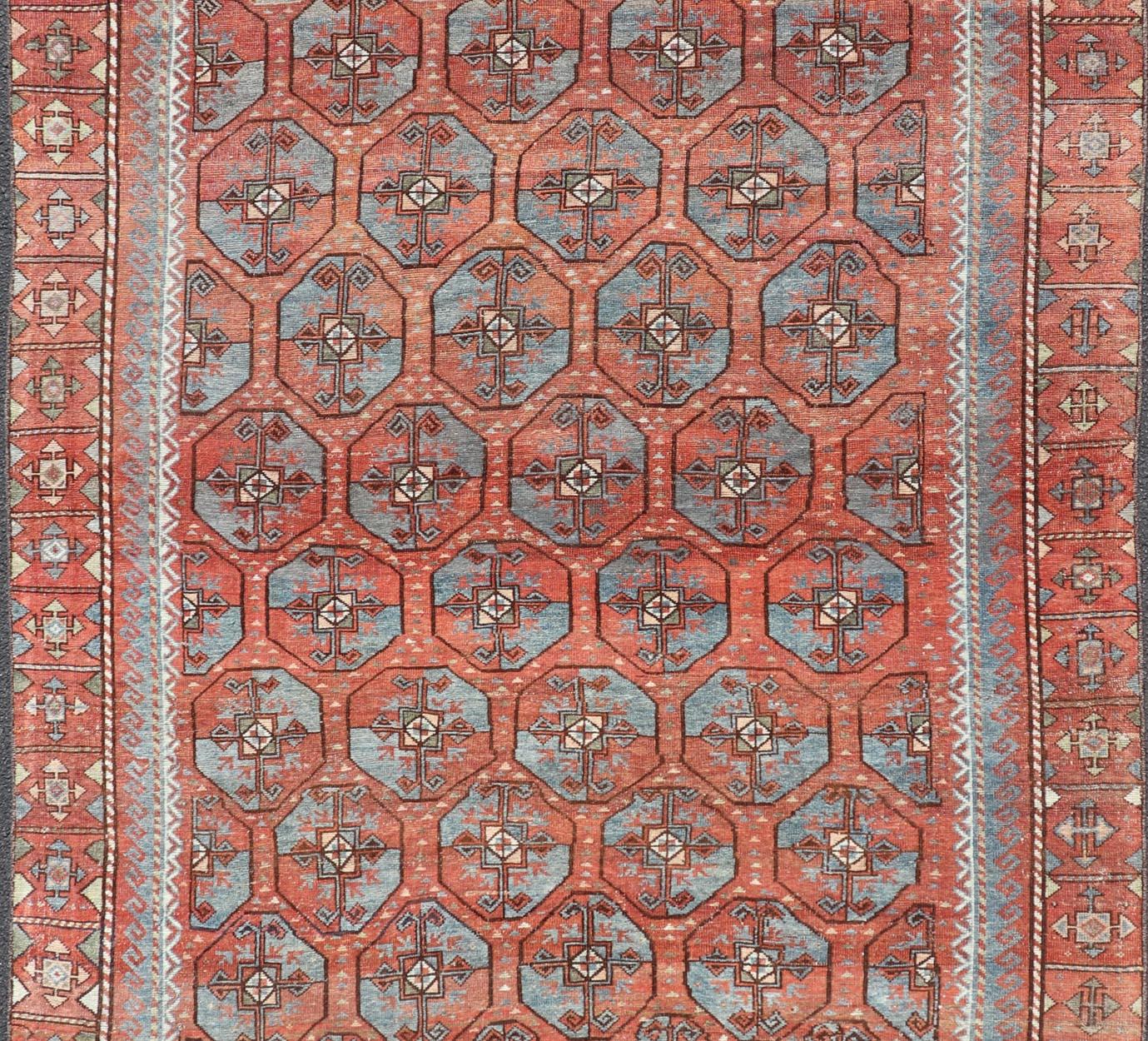 Hand-Knotted Antique East Turkistan Belouch Rug with Rich Red Lattice Design For Sale