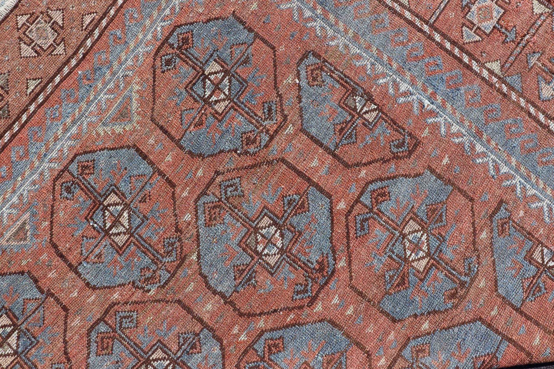 20th Century Antique East Turkistan Belouch Rug with Rich Red Lattice Design For Sale