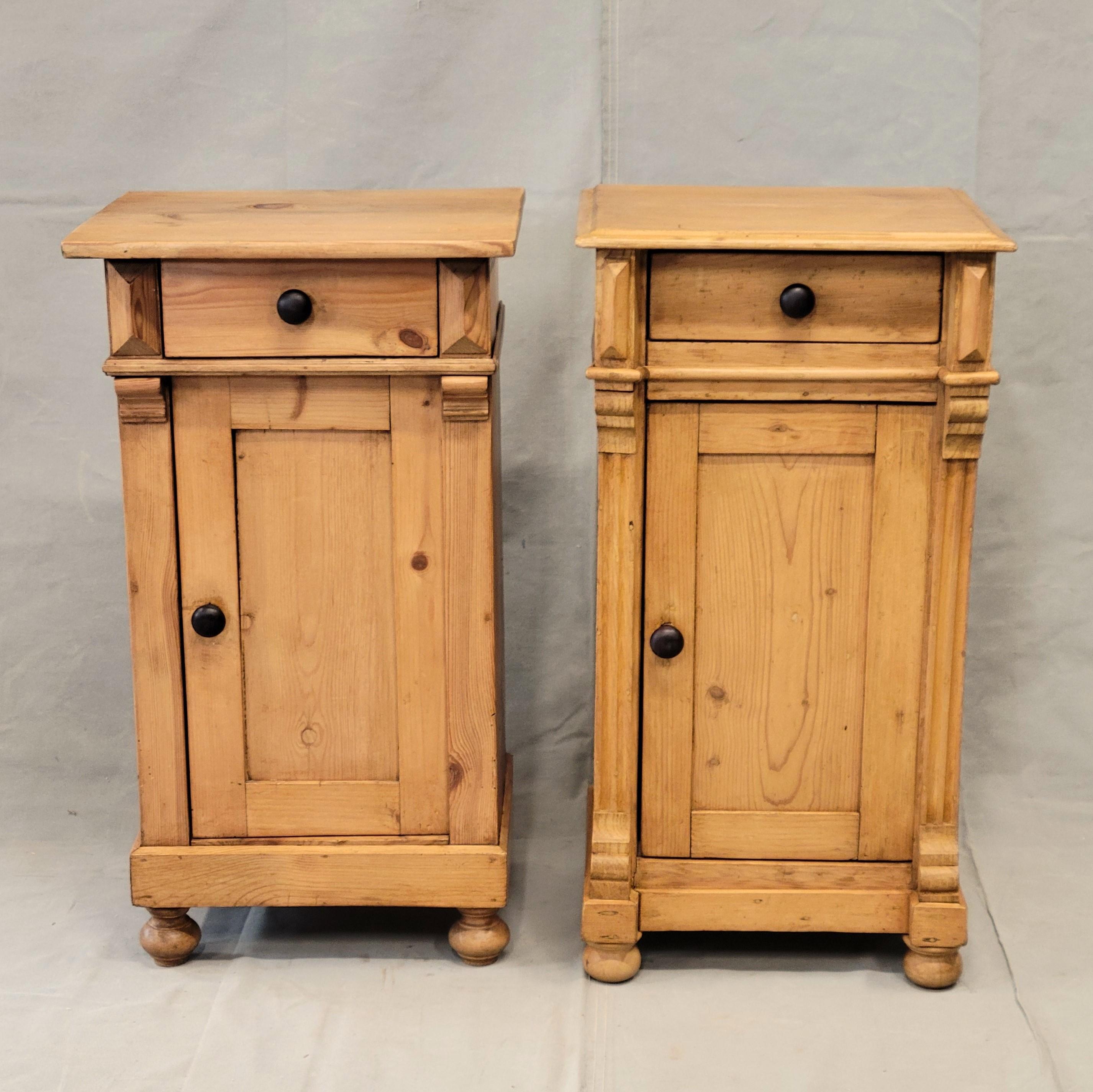 This charming near pair (similar but not the same) of antique Eastern European pine nightstands or side tables add a lovely accent to a bedroom or living area. Each nightstand offers a good amount of storage with a drawer and compartment with a