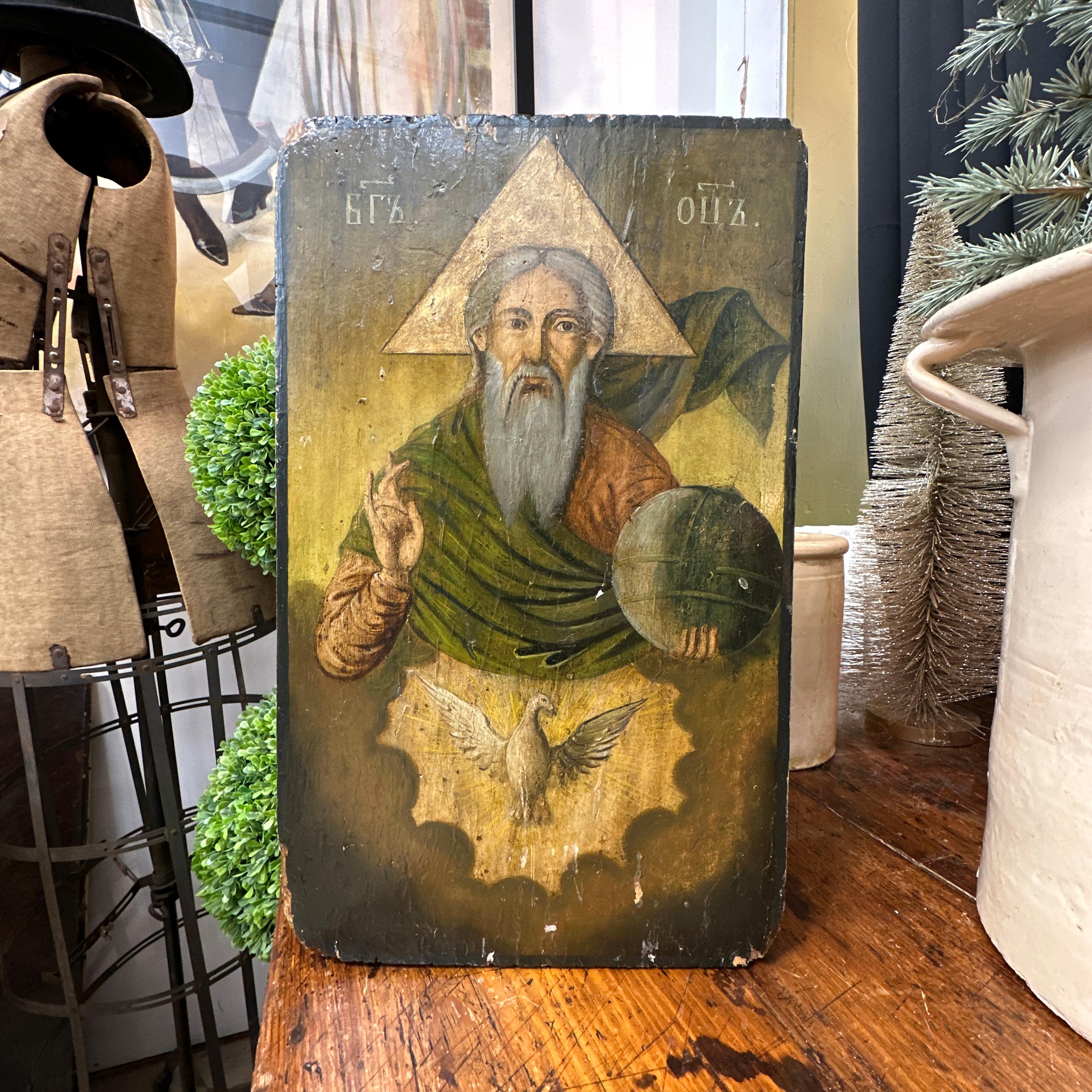 Here is a beautiful Eastern Orthodox icon, circa 19th century likely from Southeastern Poland. This piece depicts God the Father, symbolized by the triangular halo representing the Holy Trinity. Painted with meticulous detail, it features