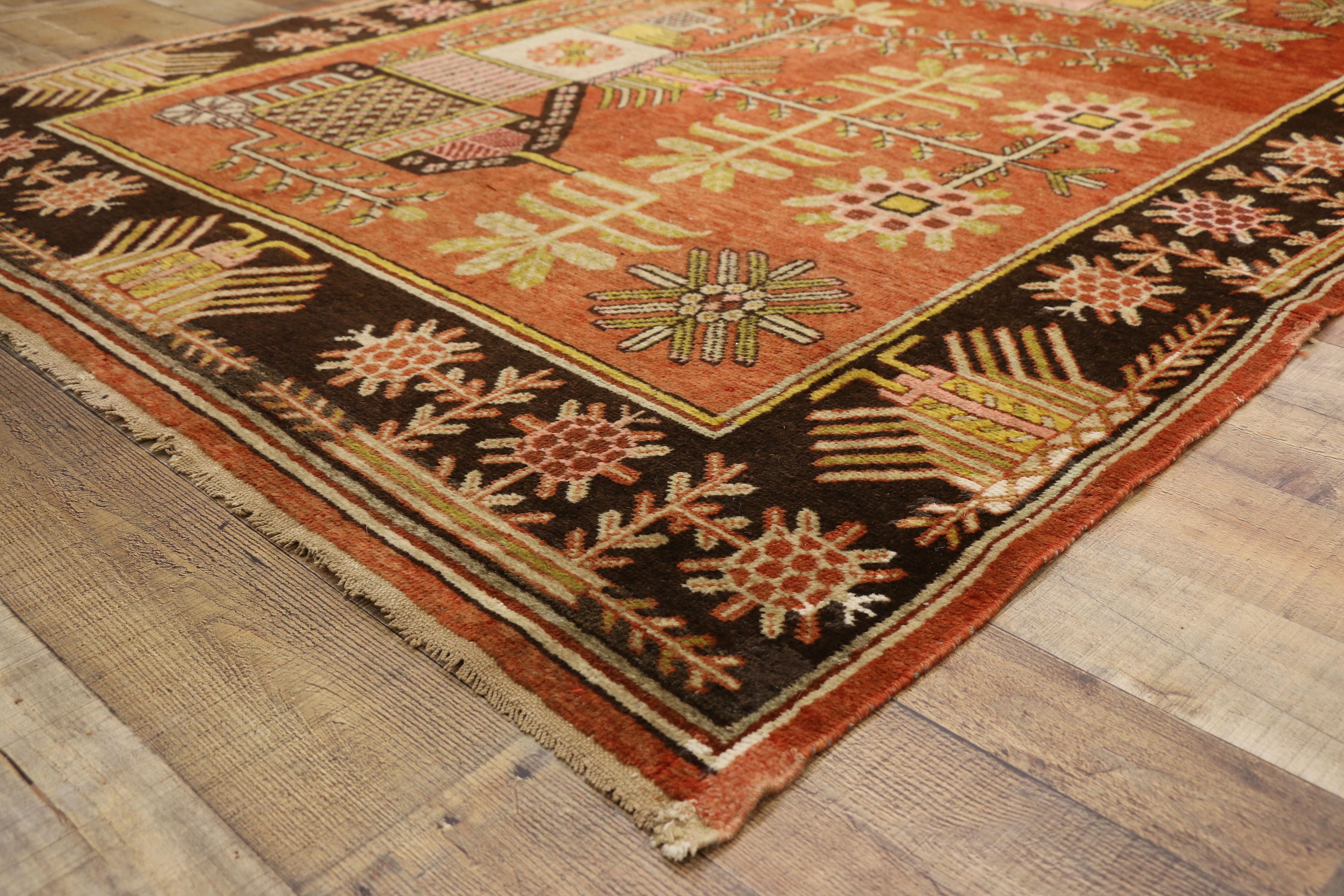 20th Century Antique Eastern Turkestan Pictorial Khotan Rug with Eclectic Northwestern Style For Sale