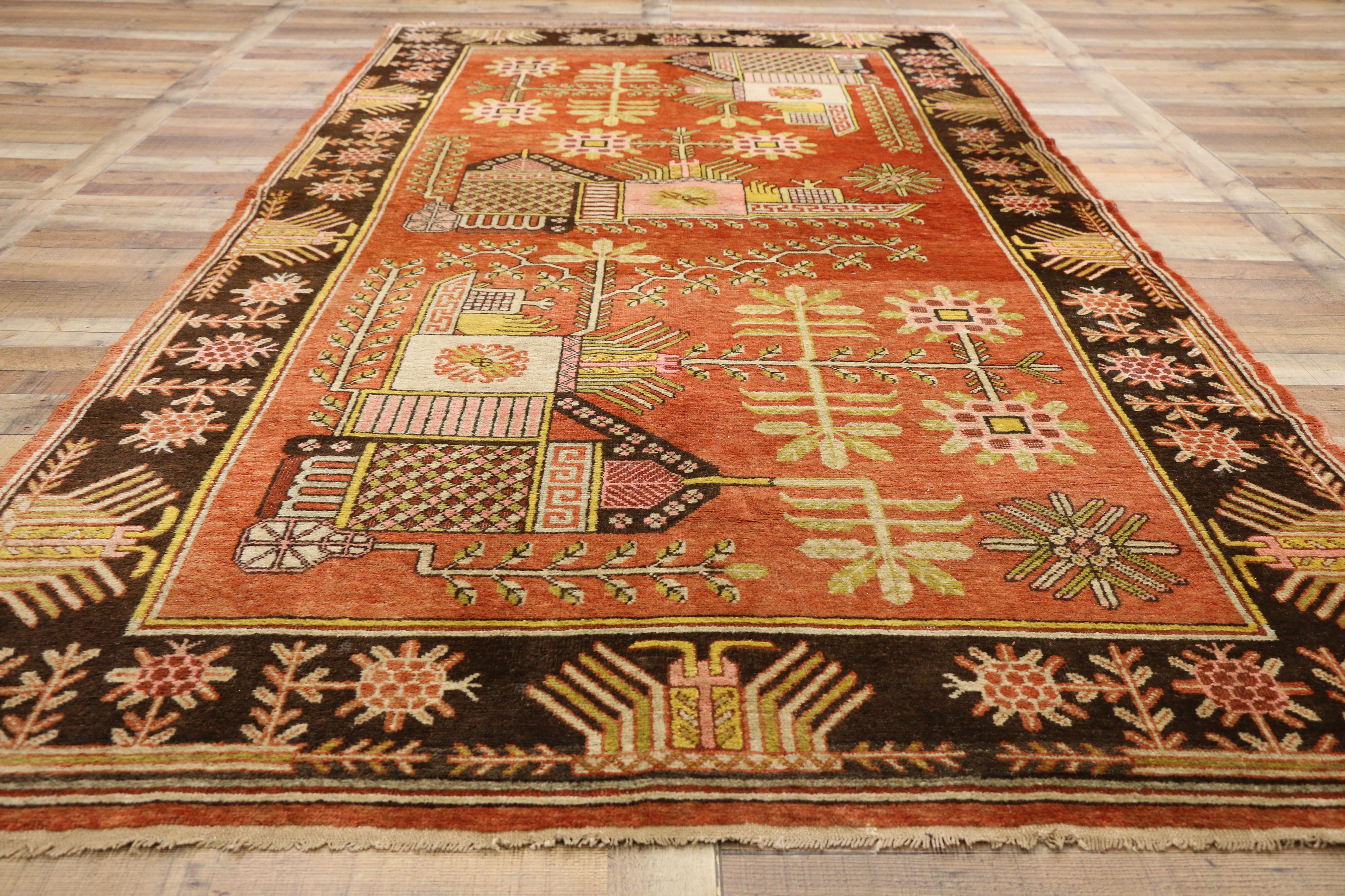 Wool Antique Eastern Turkestan Pictorial Khotan Rug with Eclectic Northwestern Style For Sale