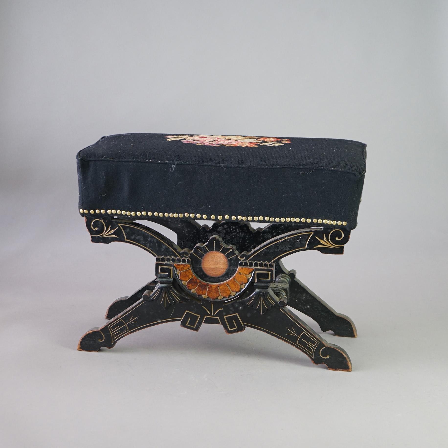 An antique footstool iin the manner of John Jelliff offers needlepoint seat over ebonized base having carved foliate elements and incised decoration with gilt highlights, c1890
Style Ebonized And Gilt Needlepoint Footstool C1890
No label

Measures-