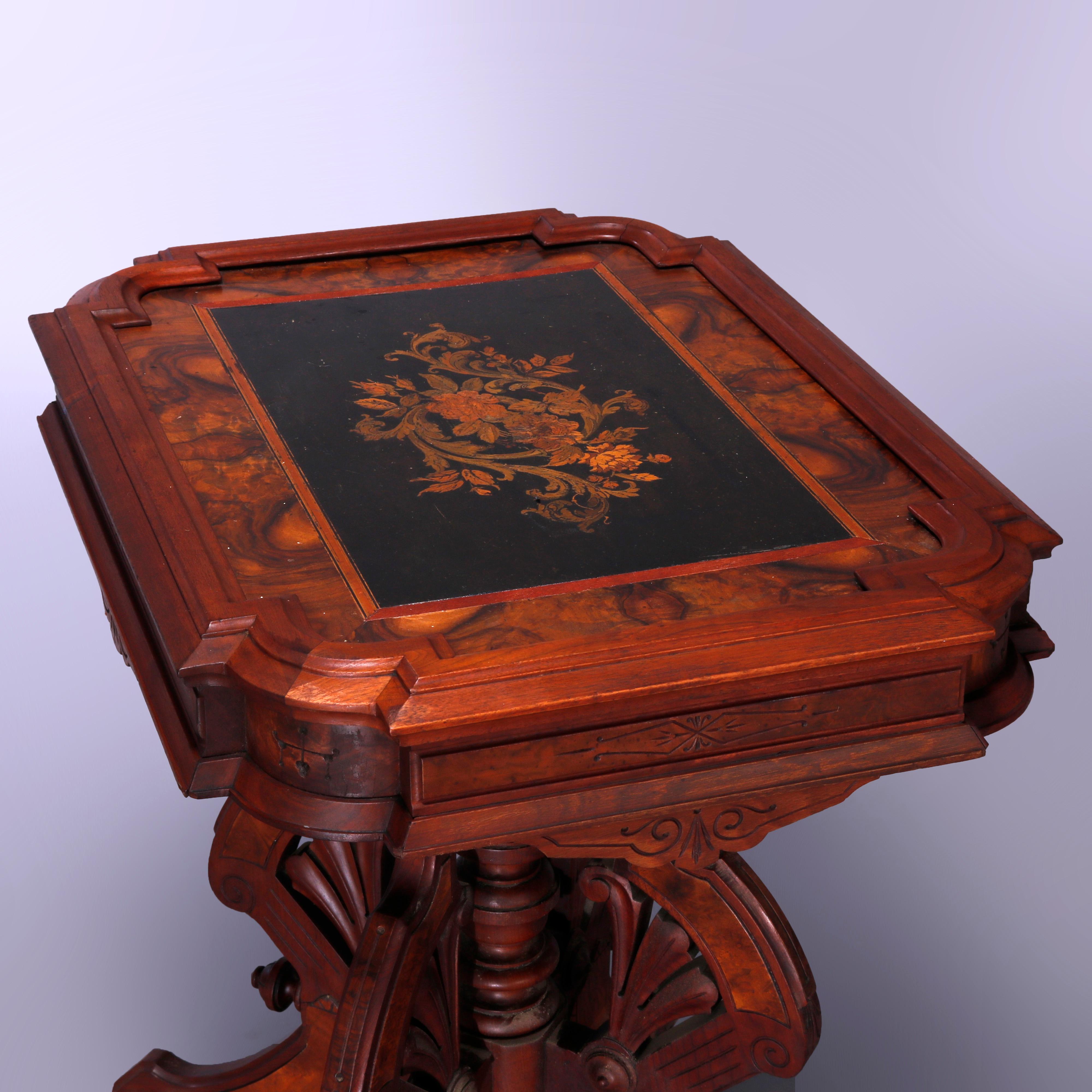 An antique Eastlake parlor table attributed to Berkey and Gay offers walnut and burl construction with stylized clip corner form and foliate and floral marquetry inlay on ebonized ground and deep skirt over base with scroll form legs having fan form