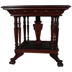 Antique Eastlake Carved Mahogany Regina Music Box Table with Paw Feet