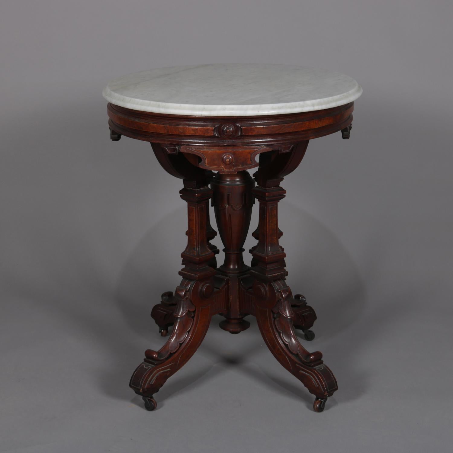 American Antique Eastlake Carved Walnut and Burl Marble Top Oval Centre Table, circa 1870