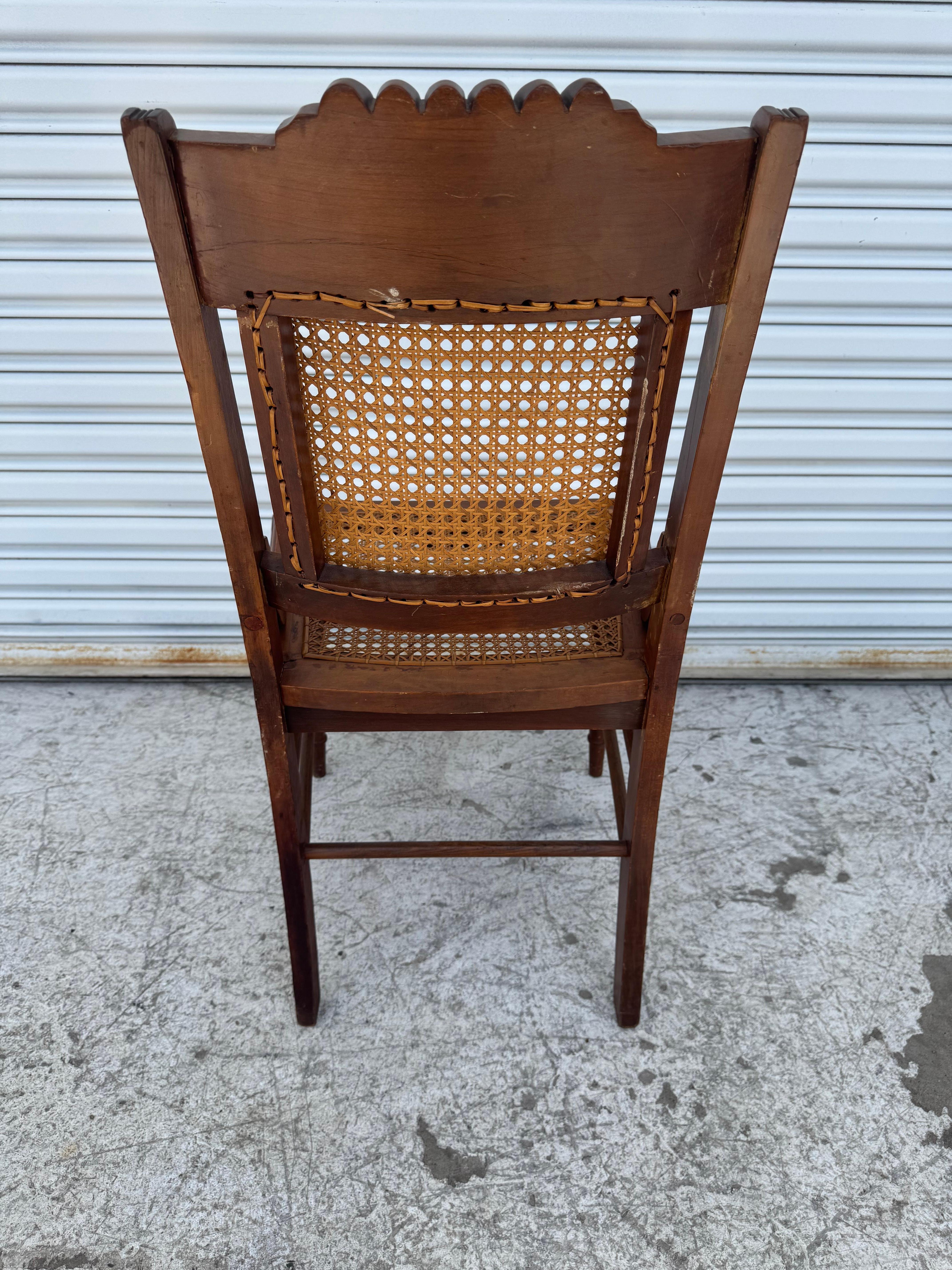 Antique Eastlake Carved Walnut and Cane Parlor Chair in vendita 1