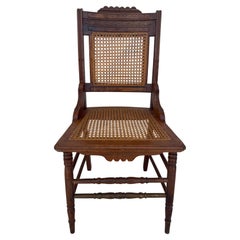 Antique Eastlake Carved Walnut and Cane Parlor Chair
