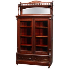 Antique Eastlake Carved Walnut Mirrored Two-Door Bookcase, circa 1890