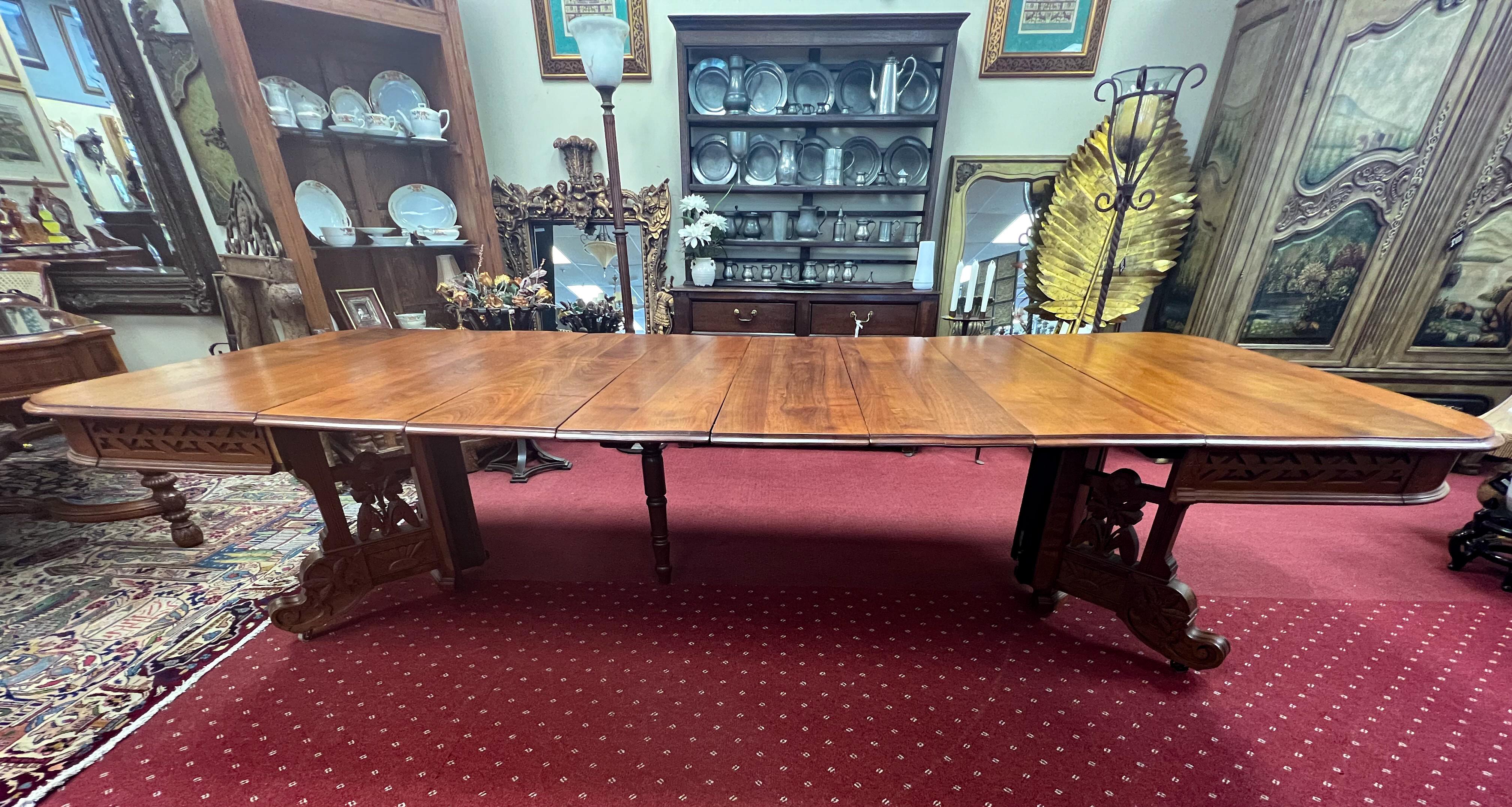 Carved Antique Eastlake Dining Table with 6 Extensions Leaves