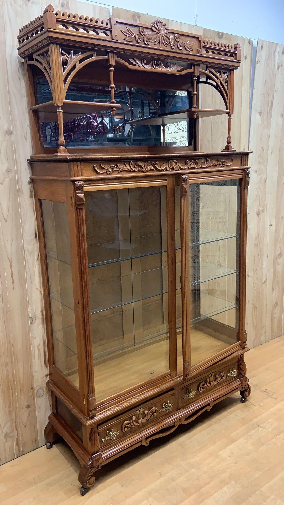 Hand-Carved Antique Eastlake Ornate Carved Walnut Double Glass-Door Bookcase Display Cabinet For Sale