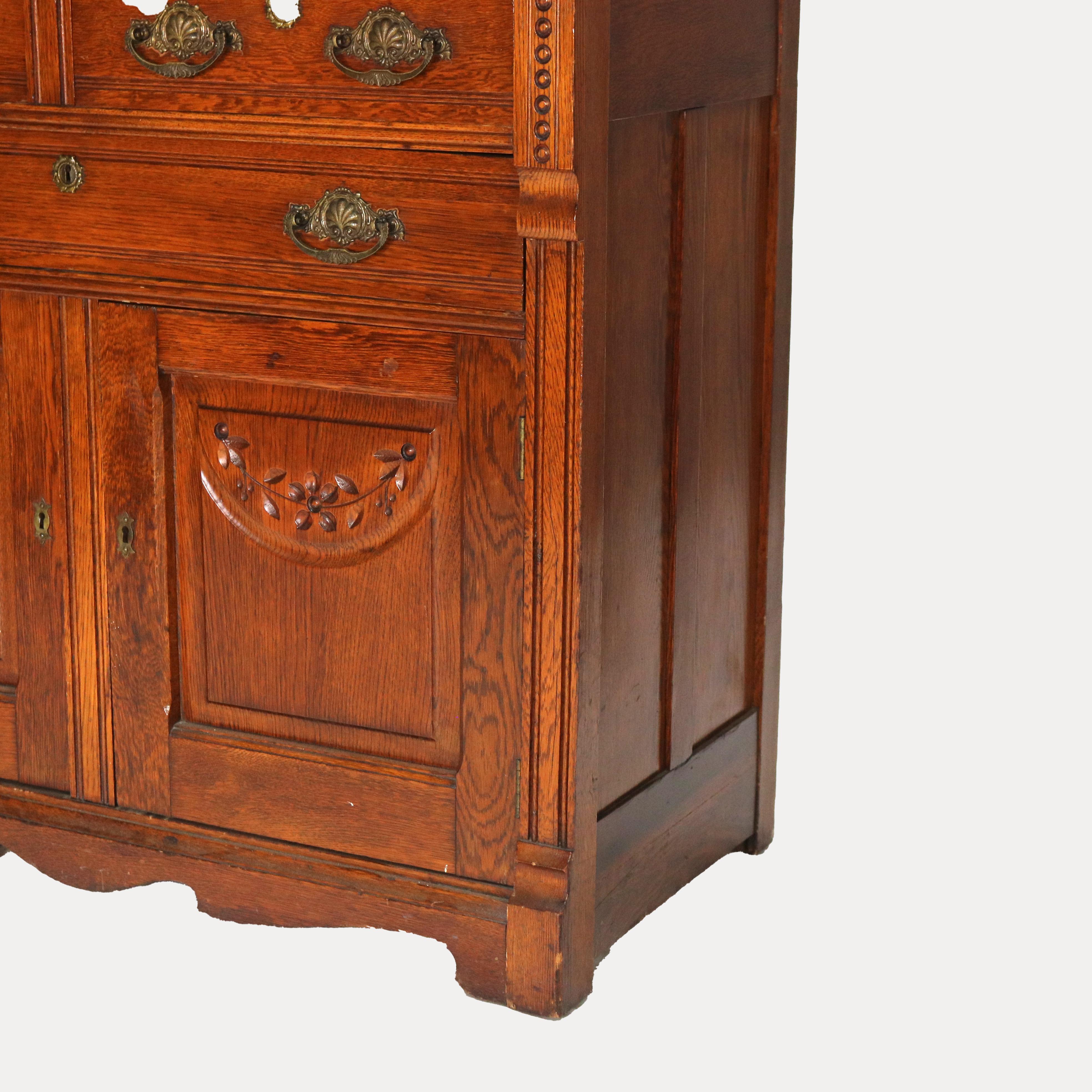 XX secolo Antique Eastlake Credenza in due pezzi in legno di Oak intagliato con specchio C1910 in vendita