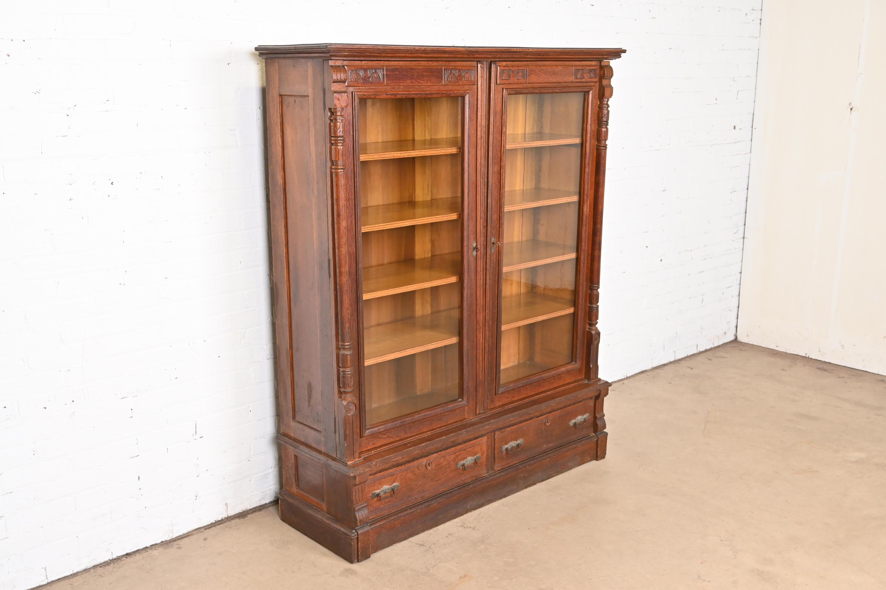 Antique Eastlake Victorian Carved Oak Bookcase, Circa 1880s 1