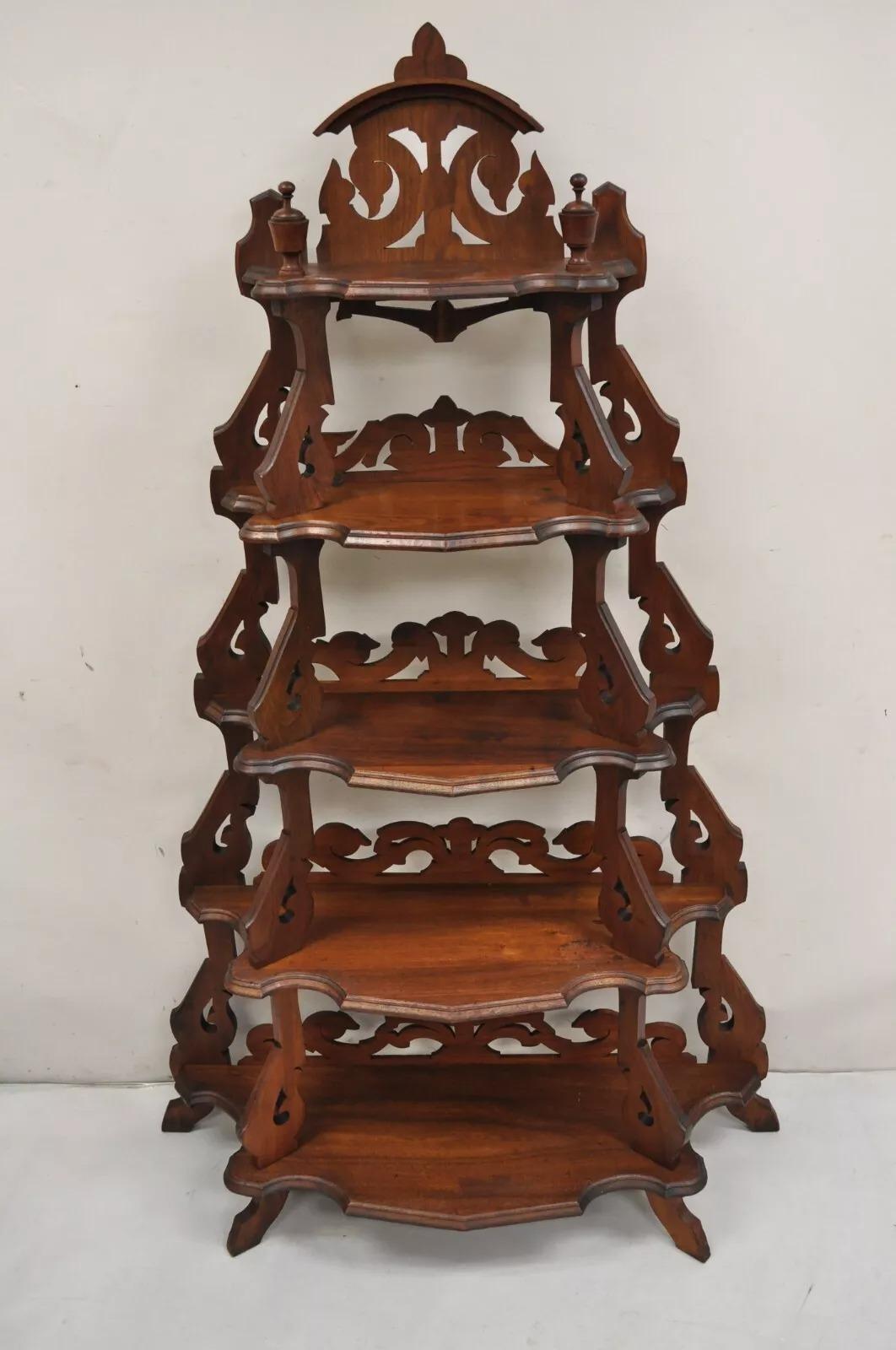 Antique Eastlake Victorian Carved Walnut 5 Tier Etagere Curio Whatnot Stand. Circa Late 19th Century. Measurements: 71