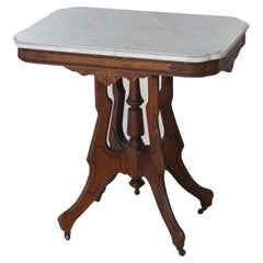 Ancienne table de salon victorienne Eastlake en noyer sculpté, loupe et marbre C1890