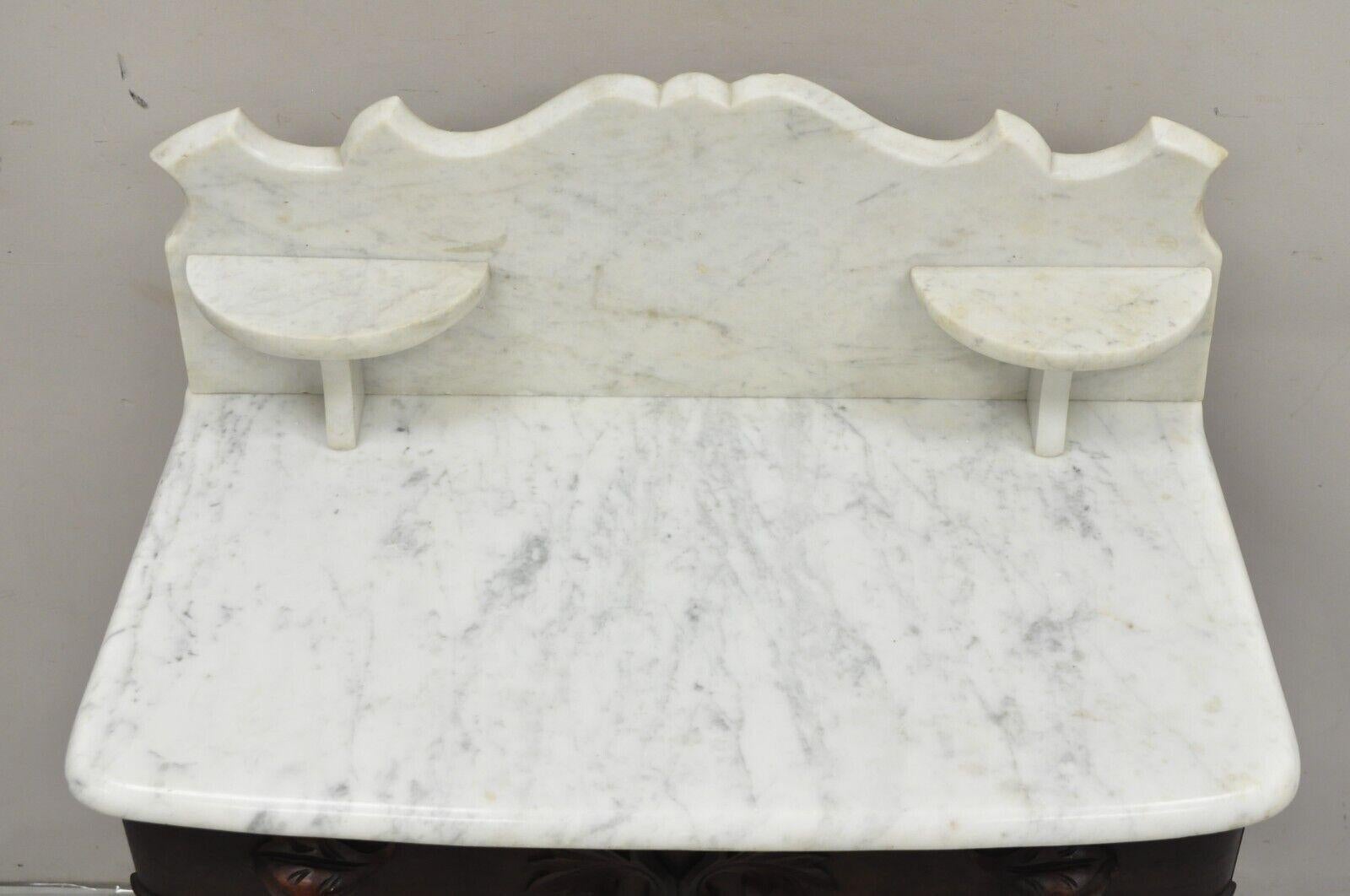 Antique Eastlake Victorian Marble Top Backsplash Walnut Washstand Commode In Good Condition For Sale In Philadelphia, PA