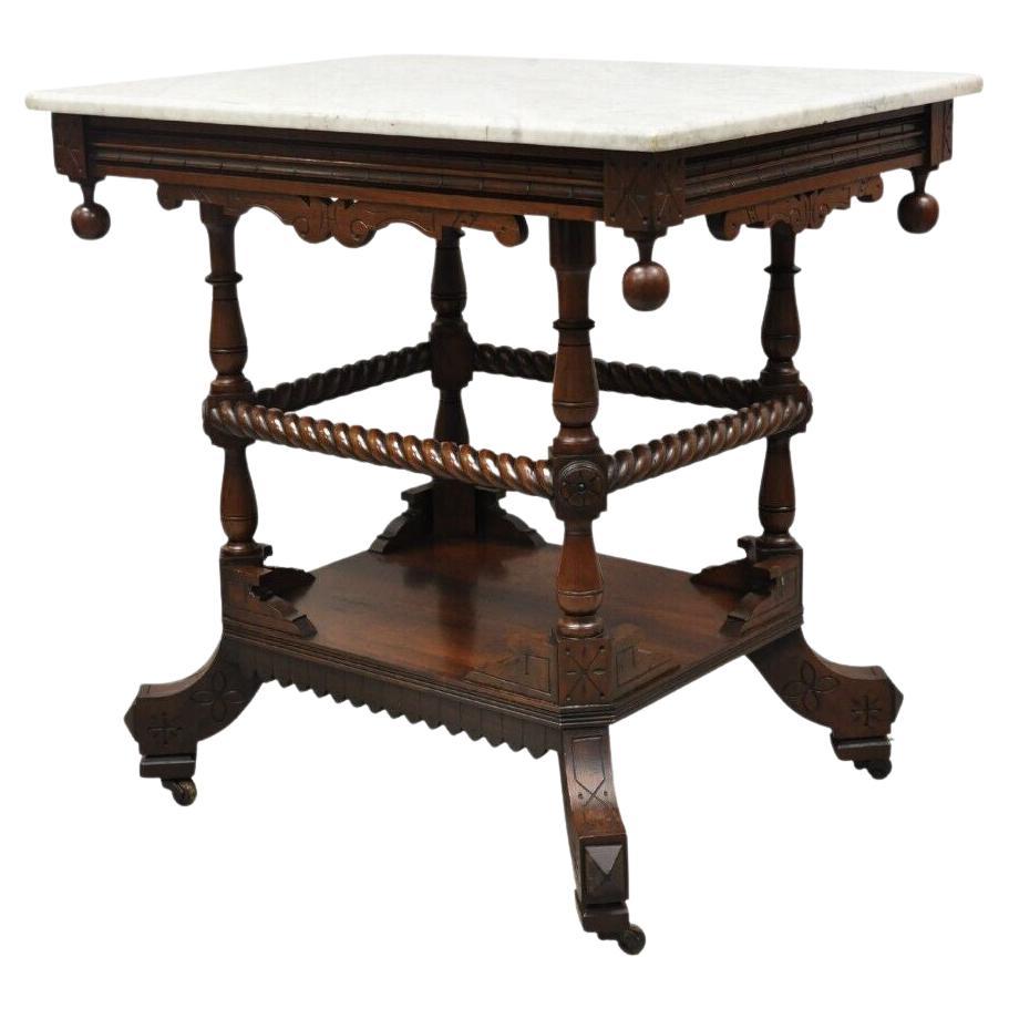 Antique Eastlake Victorian Spiral Carved Walnut Marble Top Two Tier Parlor Table For Sale