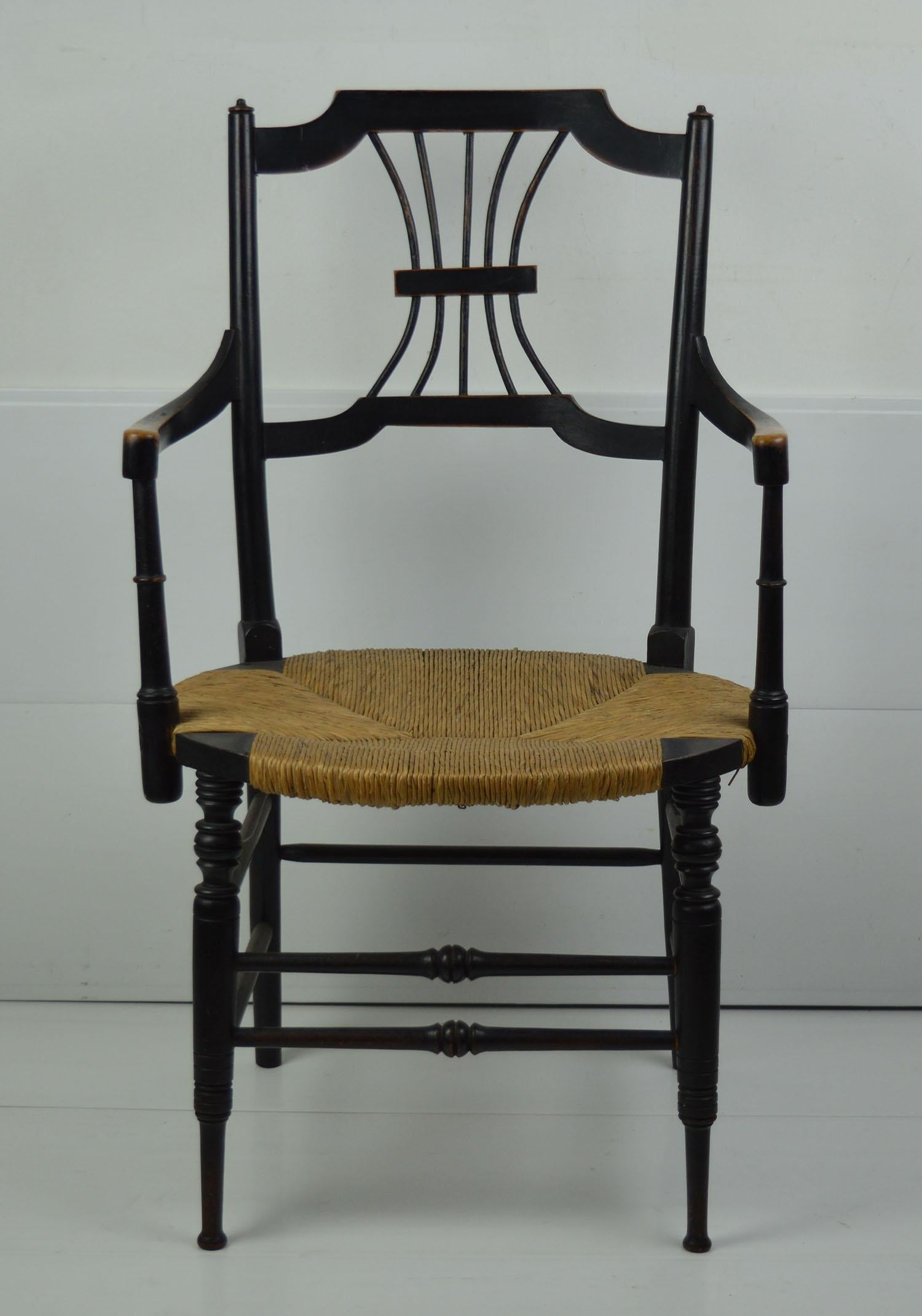 Fabulous example of a so called Sussex chair made and retailed by William Morris

Designed by Dante Gabriel Rossetti

Ebonised beech

In very good condition.

The rushing is probably original. If it isn't it has been done very well.

   