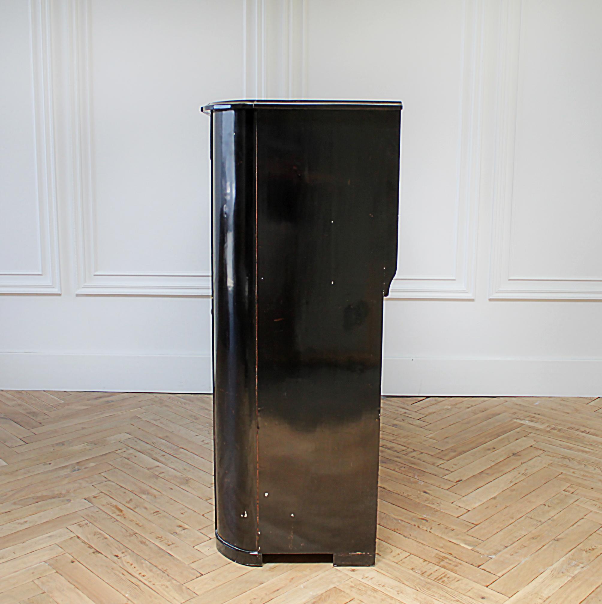 Antique ebony painted cabinet from England
Distressed black finish, with 2 working deep drawers, and original working locking key to the doors. The door open up to multiple fixed shelves, great storage.
Measures: 51