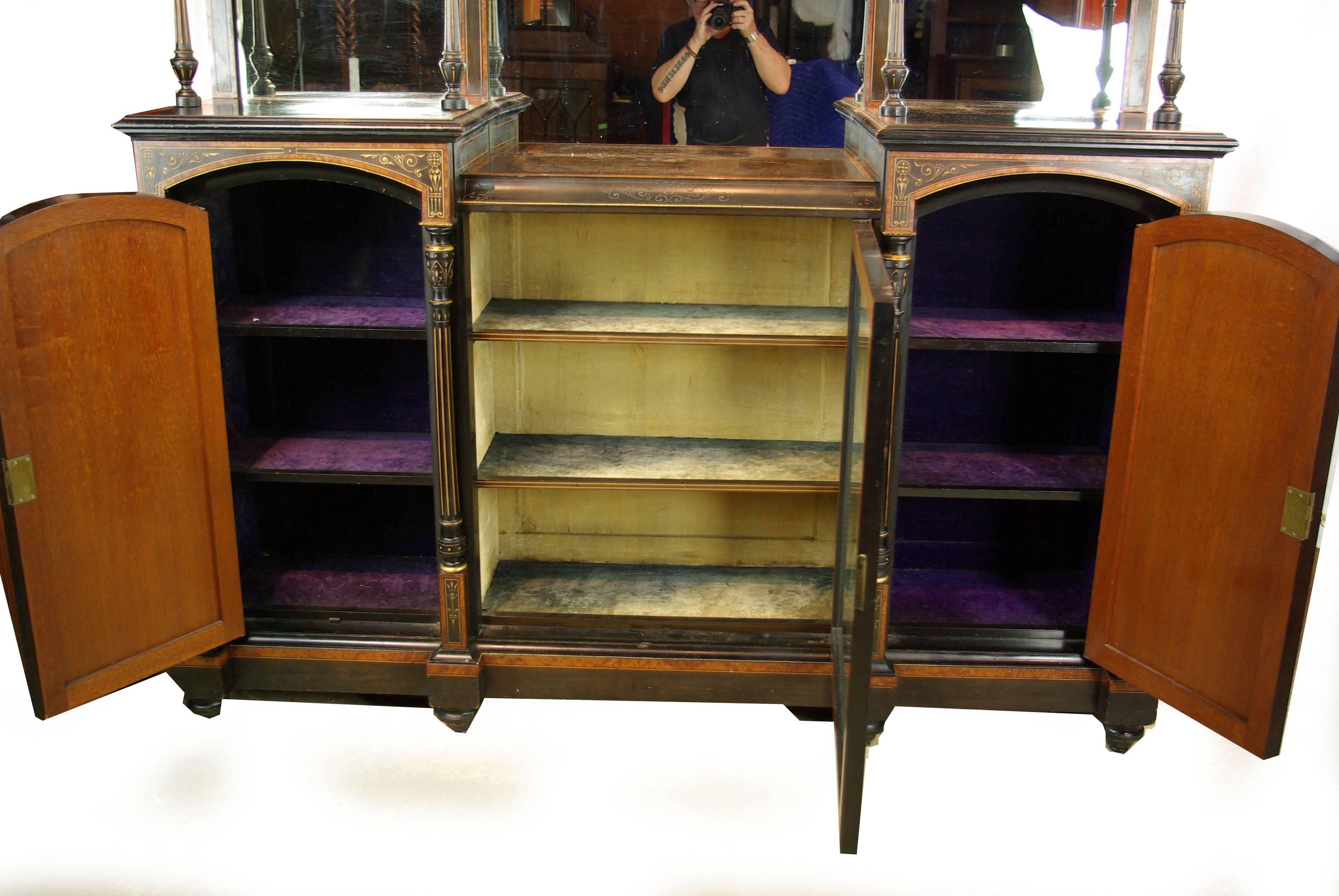 Antique ebonized sideboard, Victorian sideboard, Aesthetic Movement, Scotland 1880, antique furniture, B1134 

Scotland 1880
The top with central large mirror flanked by a pair of smaller mirrors with shelves
supported on delicate turned