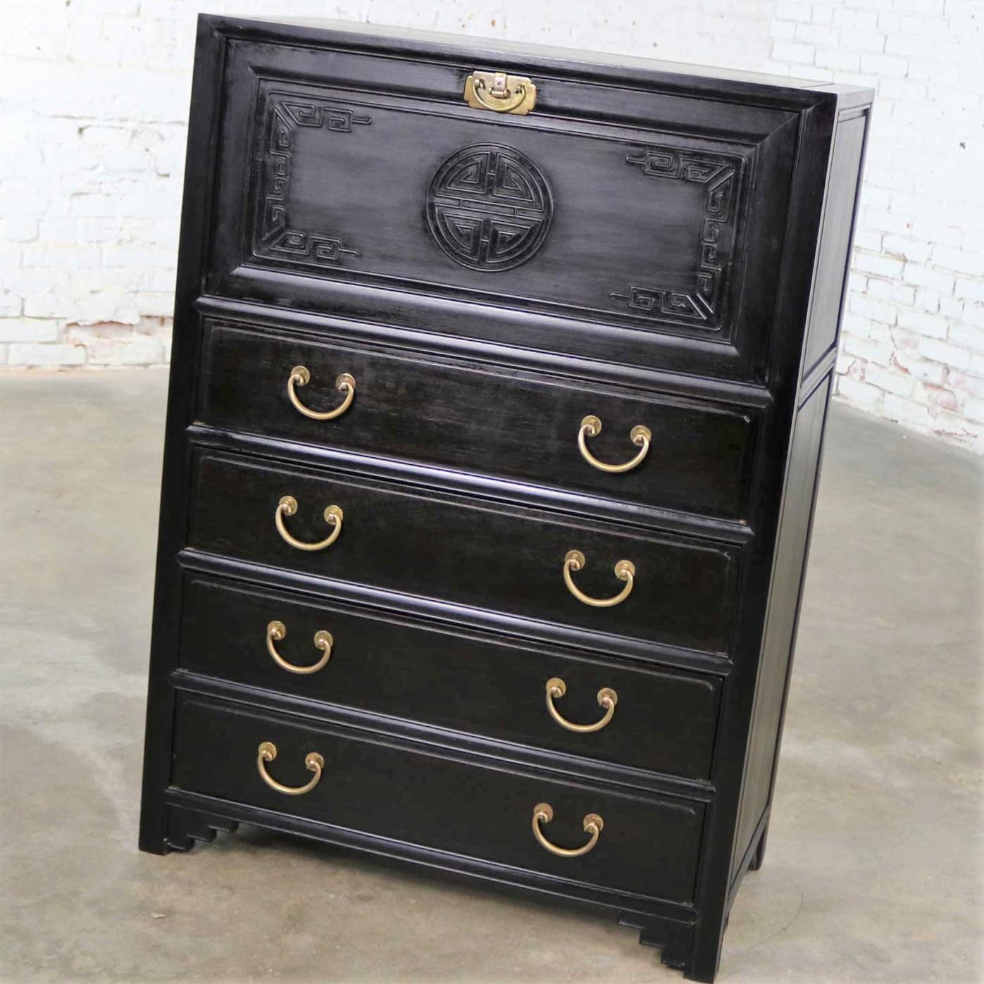 Handsome ebony wood Asian drop front desk or secretary with a carved design on the drop front. It is in wonderful antique condition. Whatever nicks and dings are present we consider part of its beautiful age patina. Please see photos, circa late