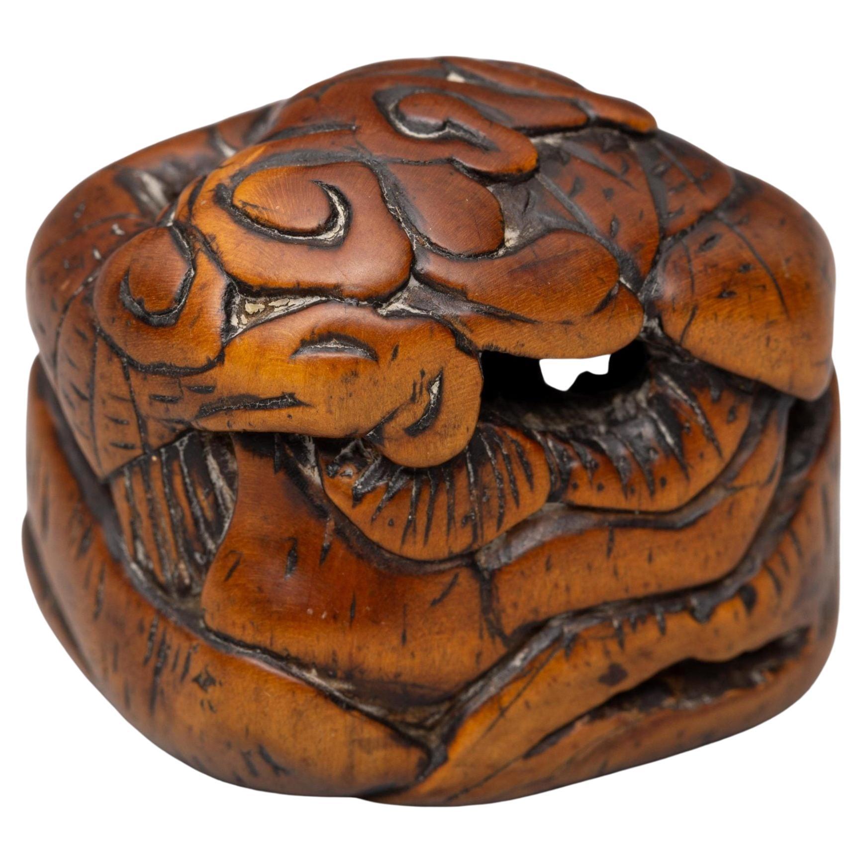 Edo Netsuke 18/19e siècle japonais Ikkosai « Différent monde dans une grotte »