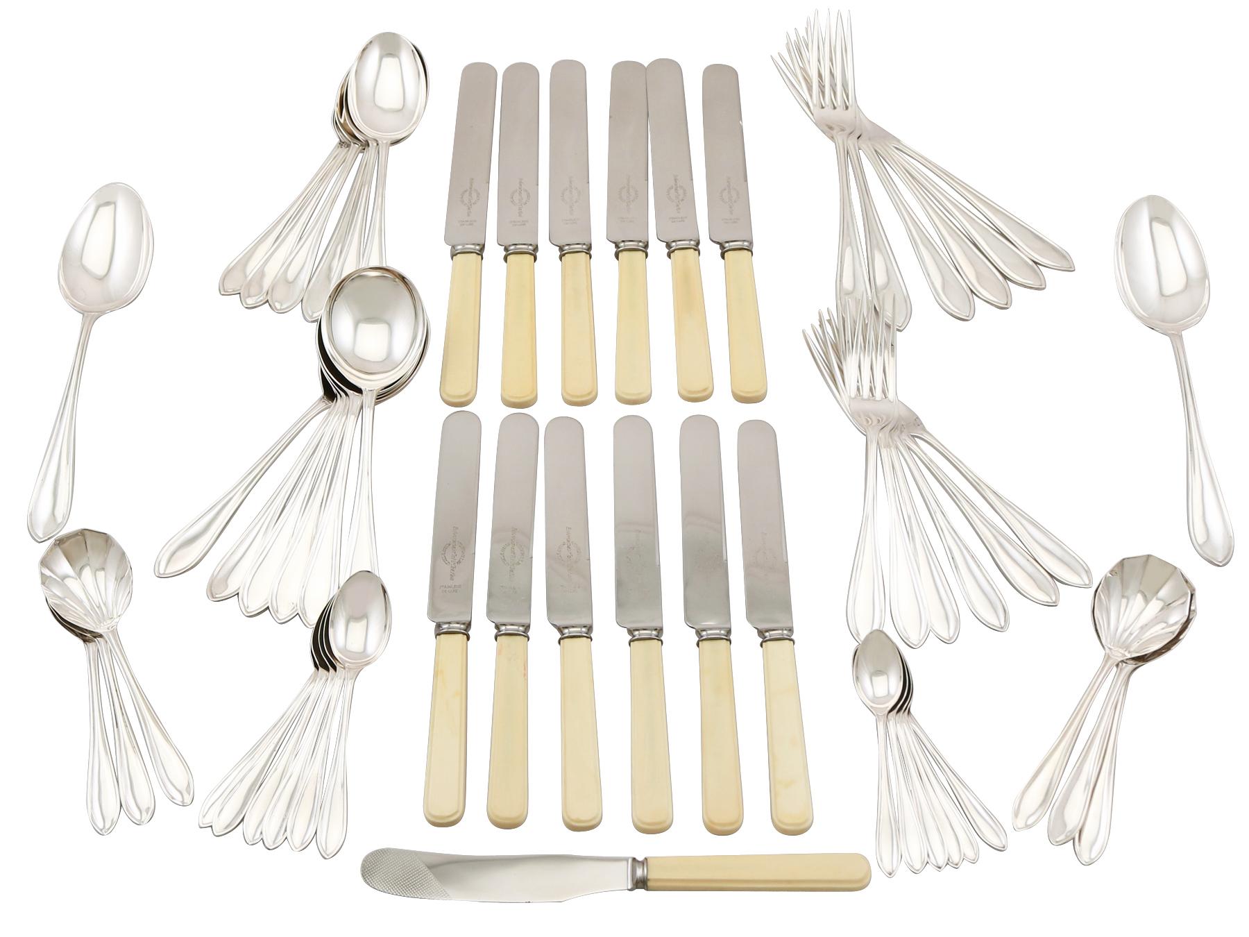 An exceptional, fine and impressive antique Edward VIII English straight sterling silver Sandringham pattern flatware service for six persons; an addition to our canteen of cutlery collection.

The pieces of this exceptional, antique Edward VIII