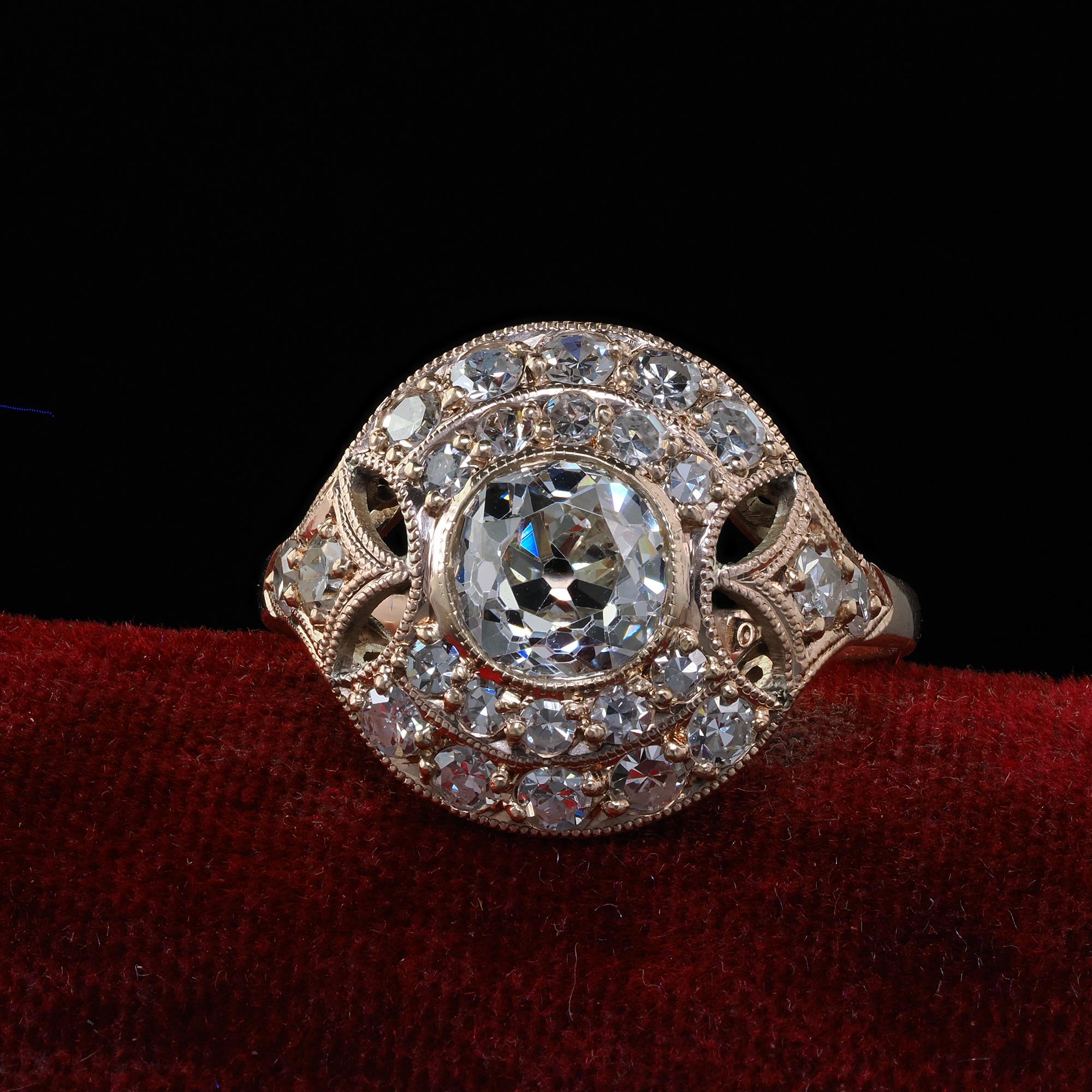 Beautiful Antique Edwardian 10K Rose Gold Old Mine Cut Diamond Engagement Ring - GIA. This incredible Antique Edwardian diamond engagement ring is crafted in 10k rose gold. The center of the ring features a gorgeous old mine cut diamond that has a