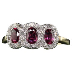 Antique Edwardian 12K Gold Platinum Ruby and Old Mine Diamond Three Stone Ring
