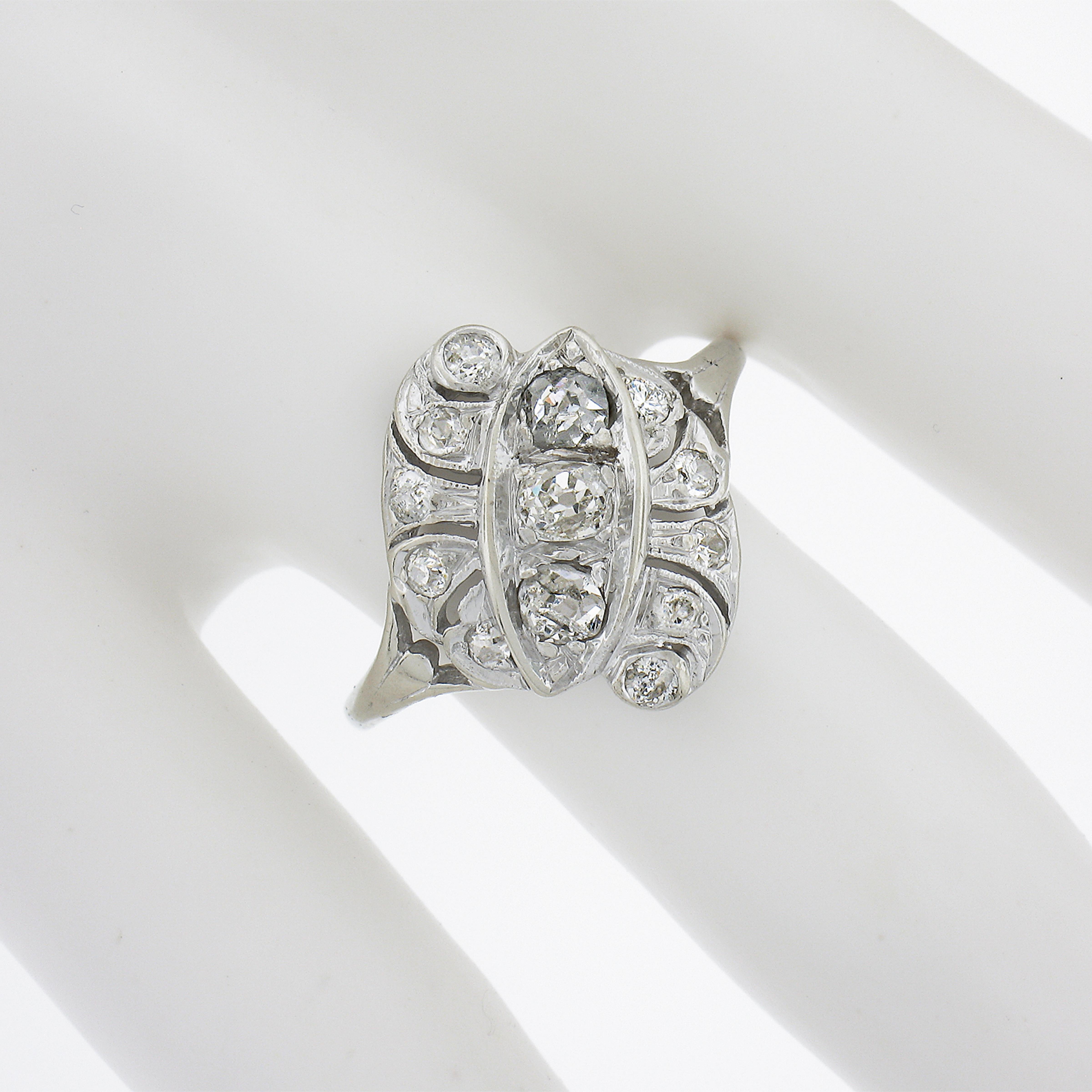 Antique Edwardian 14K White Gold 0.70ctw Old Cut Diamond Cocktail Ring In Good Condition For Sale In Montclair, NJ