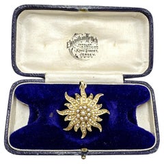 Antiguo broche/colgante eduardiano de oro amarillo de 14 quilates con perla de semilla natural Sunburst