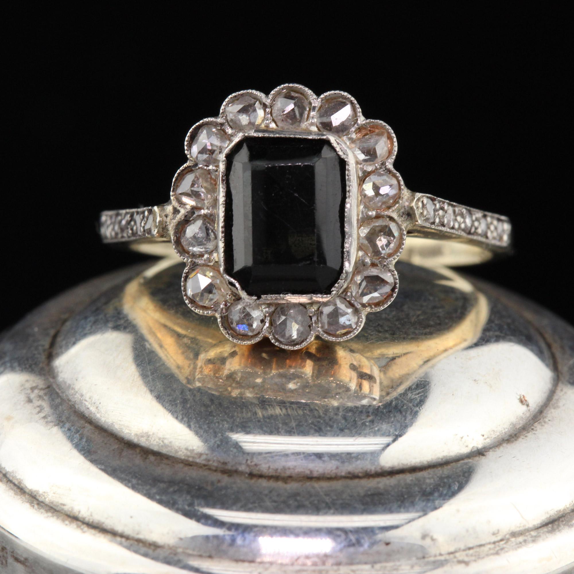 This antique cluster ring features a rectangular dark blue sapphire surrounded by a halo of rose cut diamonds.

#R0080

Metal: 14K Yellow Gold 

Weight: 3.5 grams

Ring Size: 7 3/4

This ring can be sized for a $30 fee!

*Please note we cannot