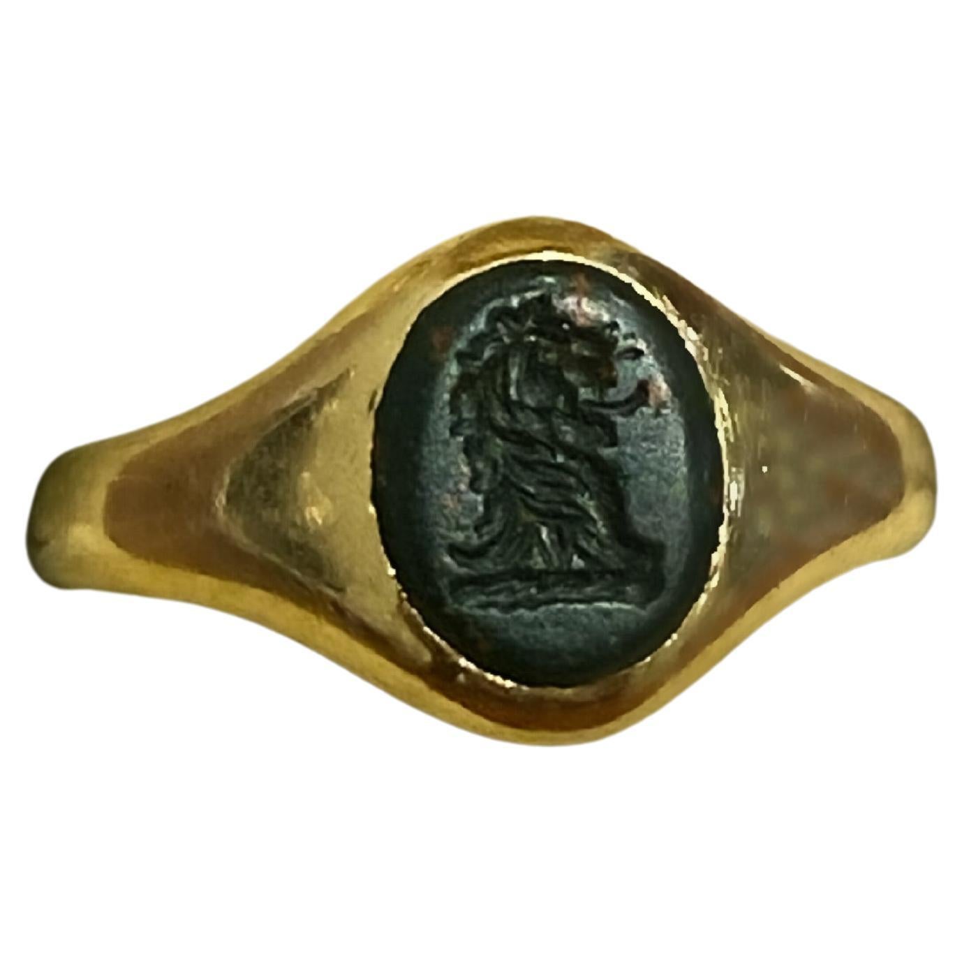 Ancienne bague édouardienne en or 15 carats, pierre de sang « Lion », sceau rose, signée en taille-douce