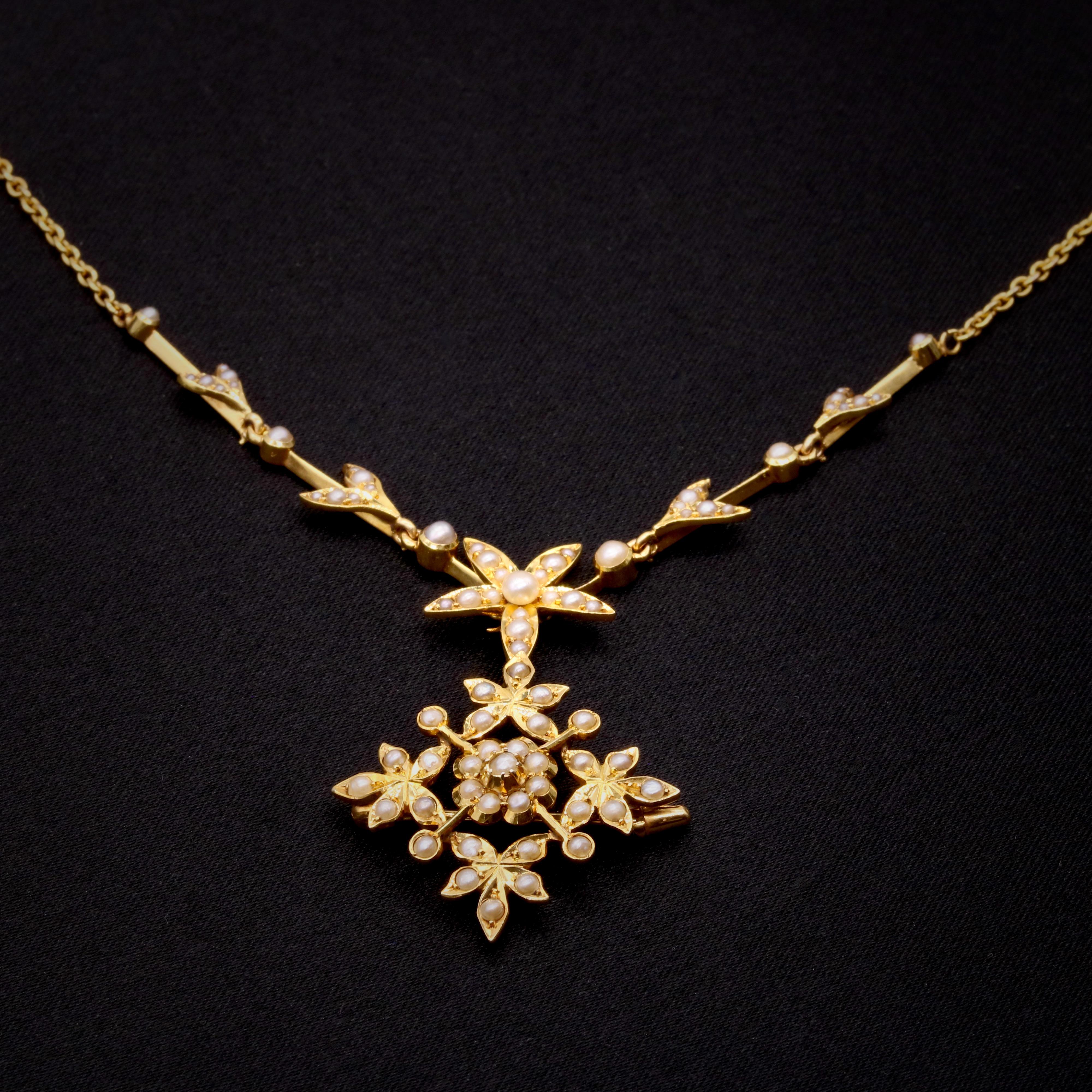 An Edwardian seed pearl, and yellow gold necklace, comprising seventy-nine seed pearls, set in 15 karat yellow gold, with a 15 karat yellow gold chain. 

This elegant necklace is designed to be incredibly wearable. The necklace section can be worn