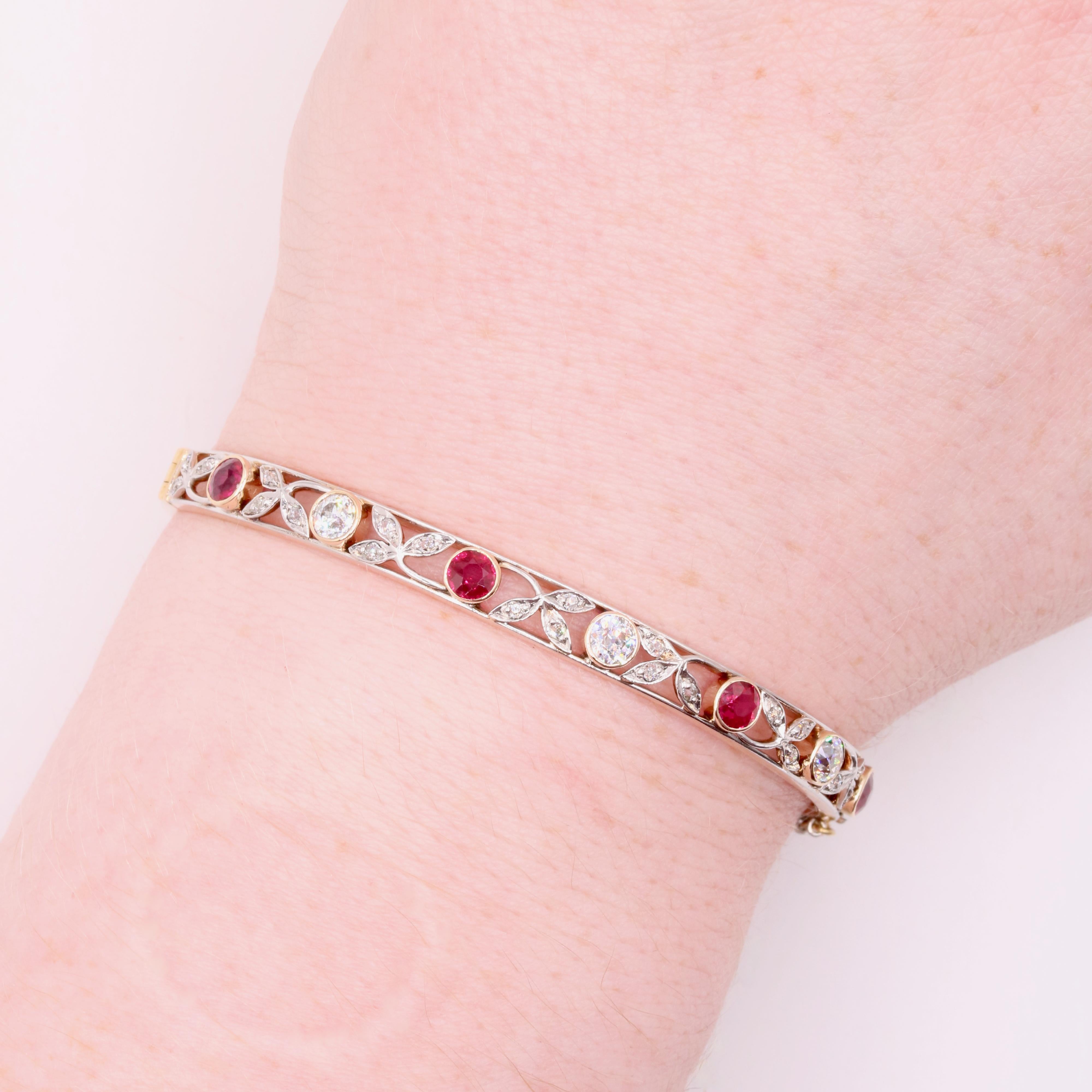 An Edwardian ruby, diamond, platinum, and yellow gold bangle, comprising for round cut rubies, three old European cut diamonds, and twenty-found old single cut diamonds, in platinum and 15 karat yellow gold. 

My favourite thing about this Antique