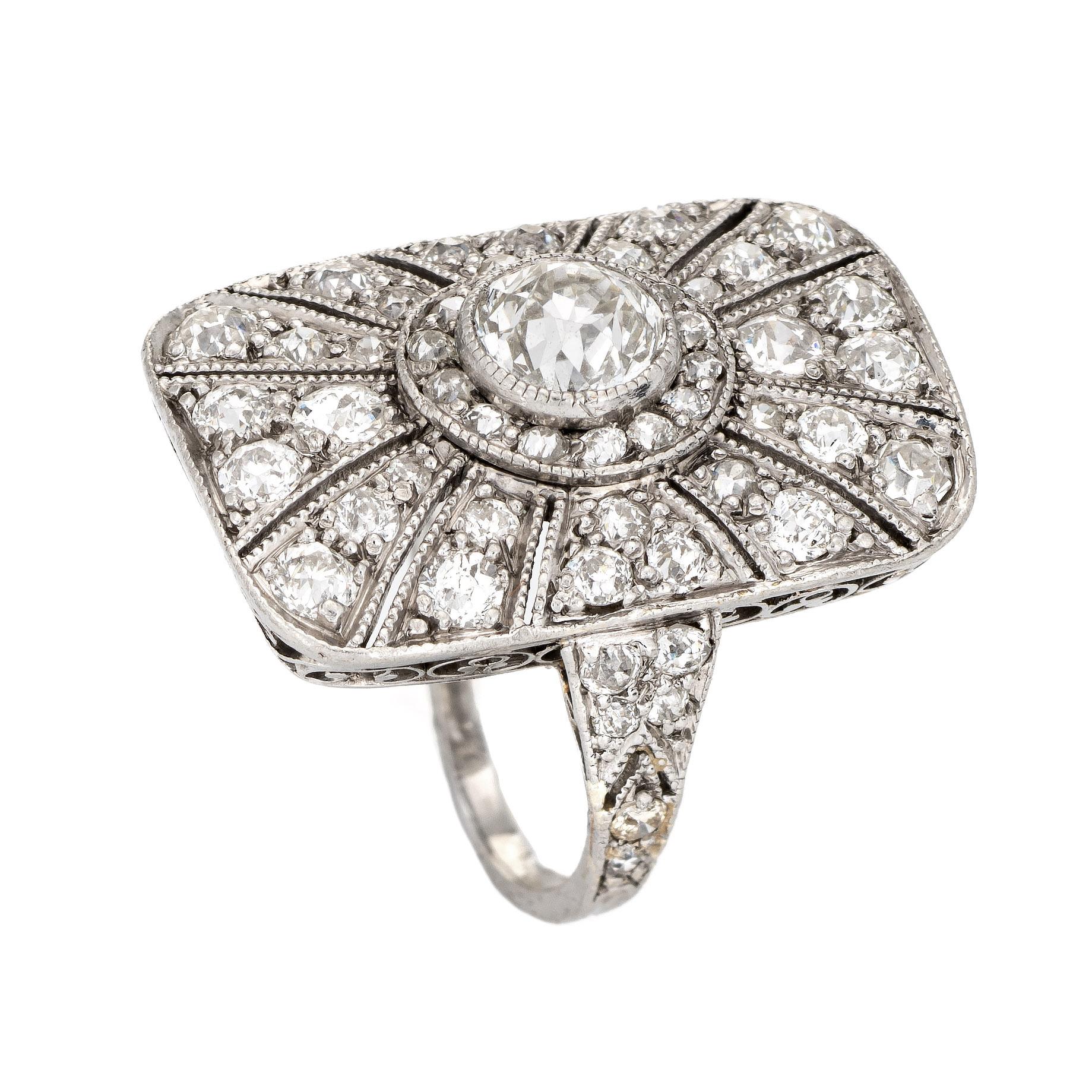 Finely detailed antique Edwardian diamond ring crafted in platinum (circa 1910s to 1920s).  

Center set old European cut diamond is estimated at 0.60 carats, accented with a further 1.10 carats of diamonds. The total diamond weight is estimated at